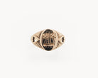 Vintage signet ring reworked with etched face, front view