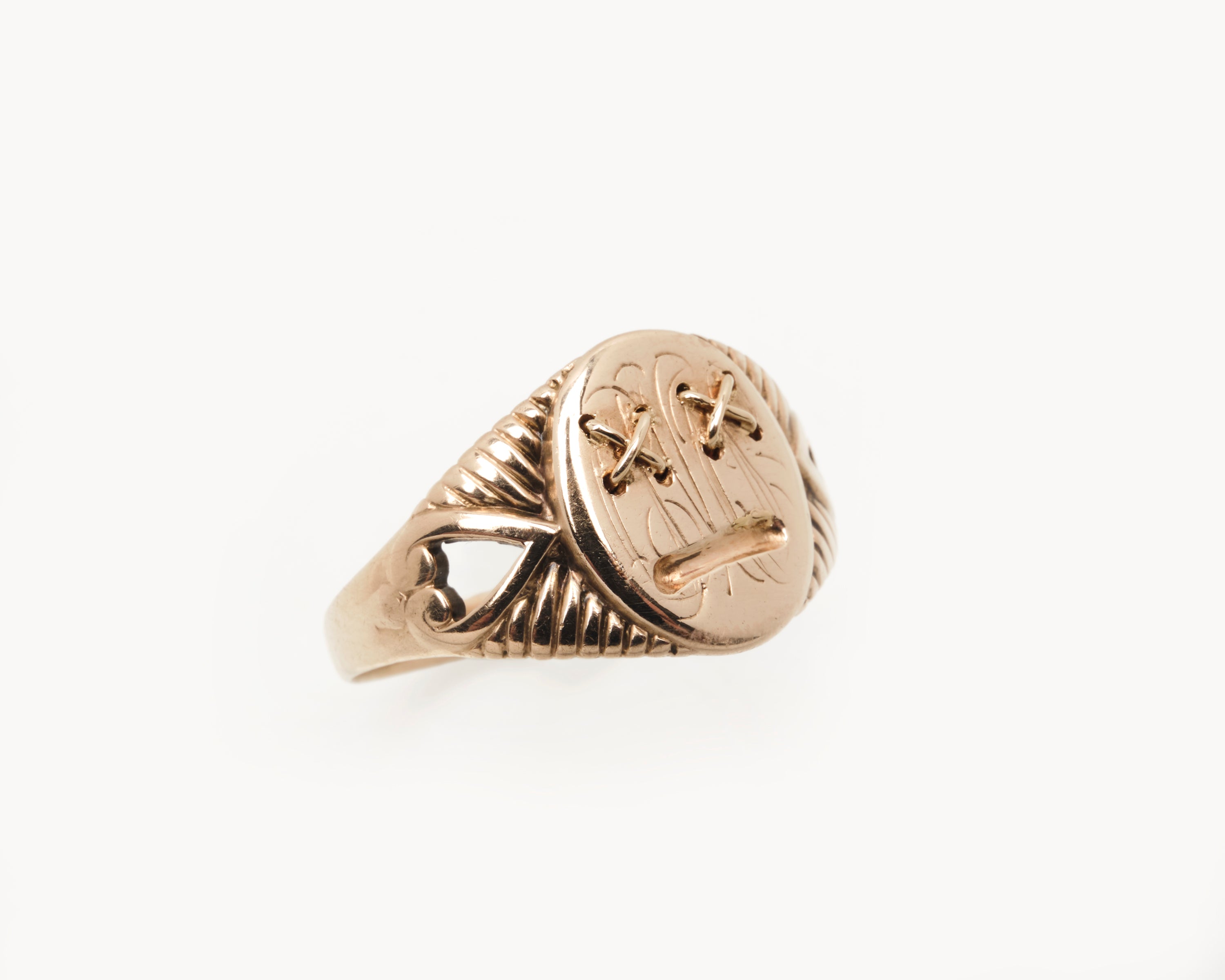 Vintage signet ring reworked with etched face, front view 