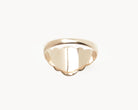 Vintage signet ring reworked with etched face, back view. 