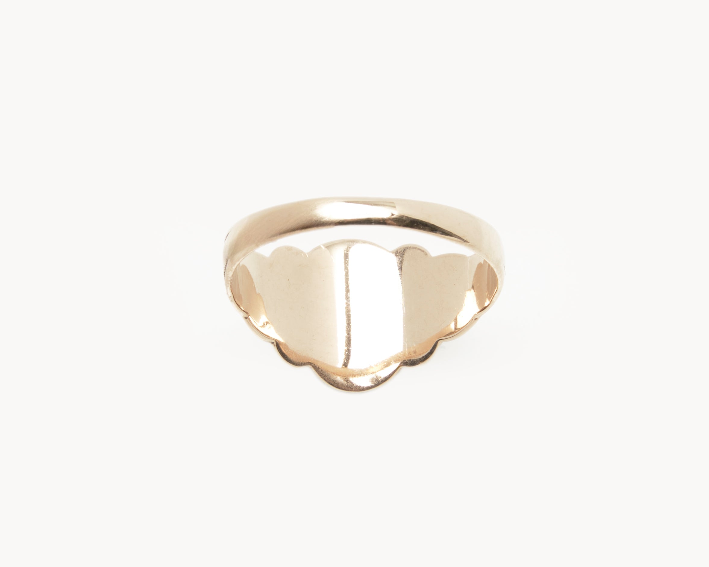 Vintage signet ring reworked with etched face, back view. 