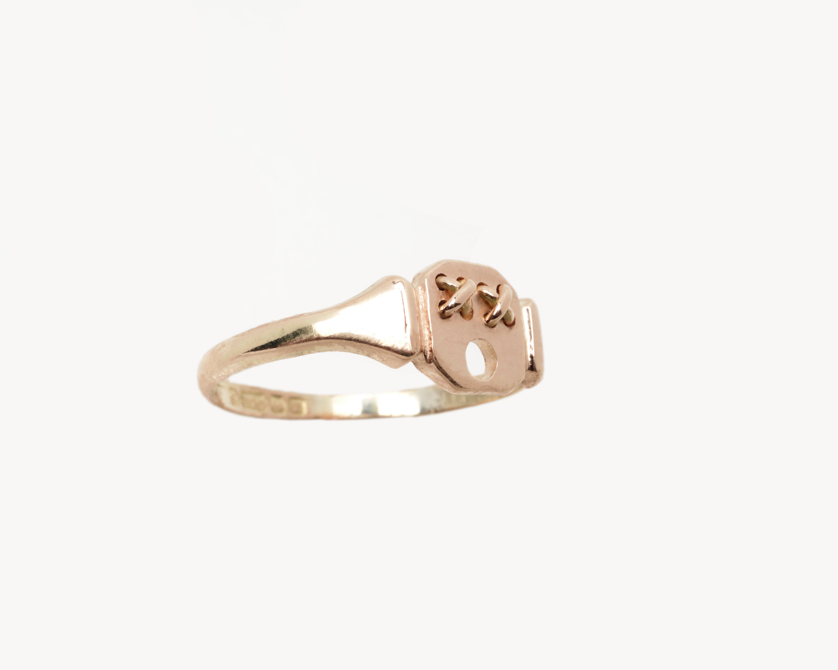 Vintage signet ring reworked with etched face, side view. 