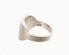 Vintage signet ring reworked with etched face, back view. 