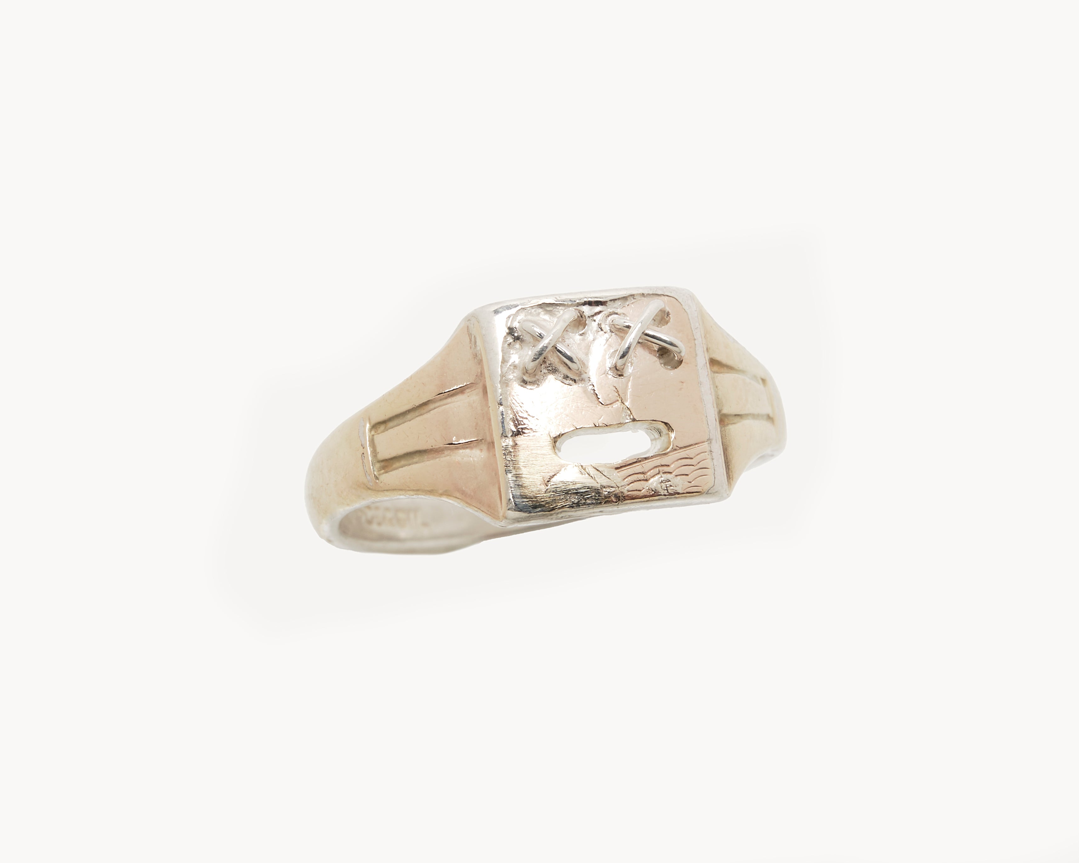 Vintage signet ring reworked with etched face, front view. 