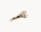Vintage signet ring reworked with etched face, side view. 