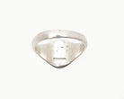 Vintage signet ring reworked with etched face, back view. 