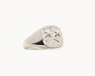 Vintage signet ring reworked with etched face, front view. 