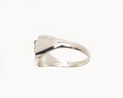 Vintage signet ring reworked with etched face, side view. 