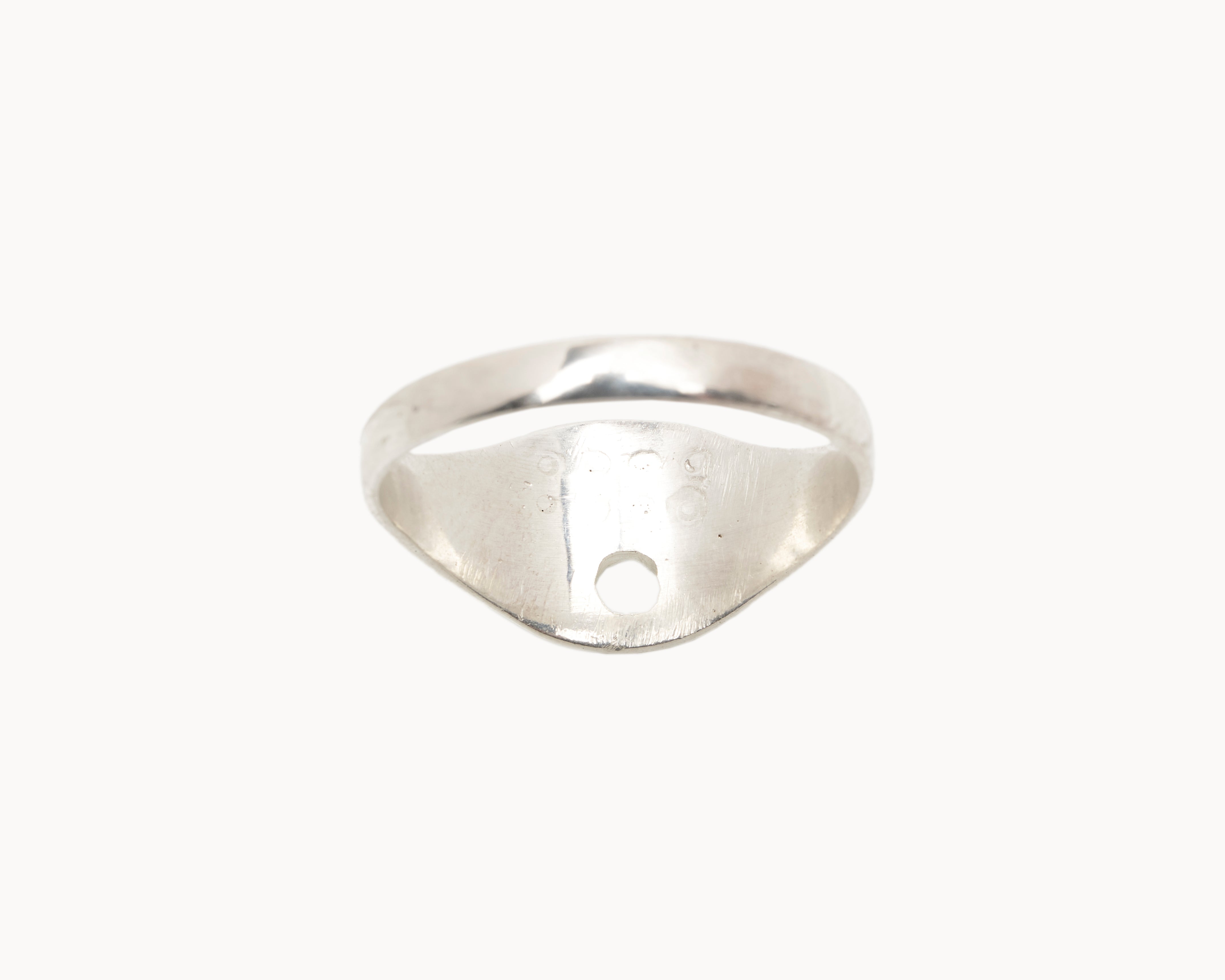 Vintage signet ring reworked with etched face, back view. 
