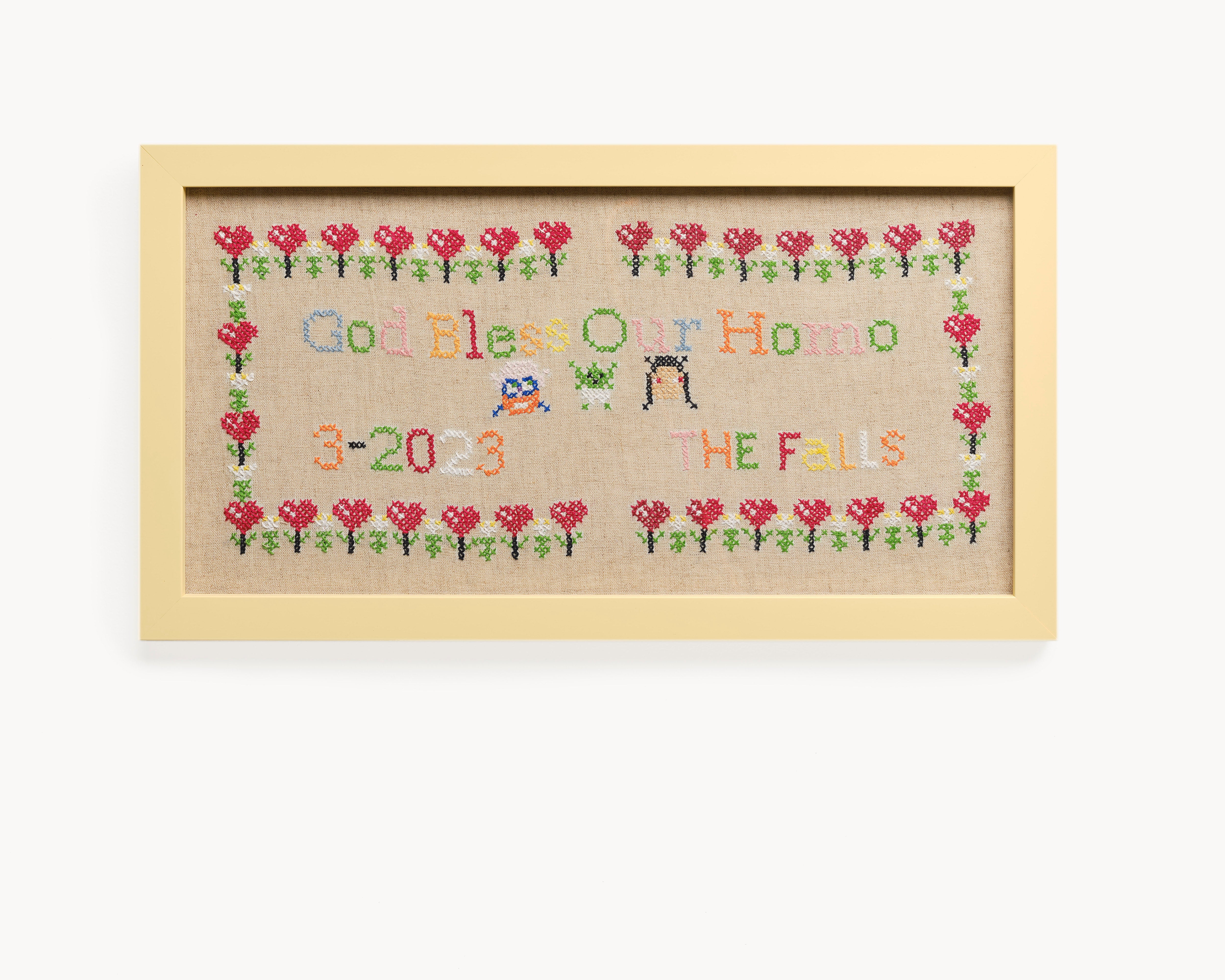 Upcycled framed sampler, front view 