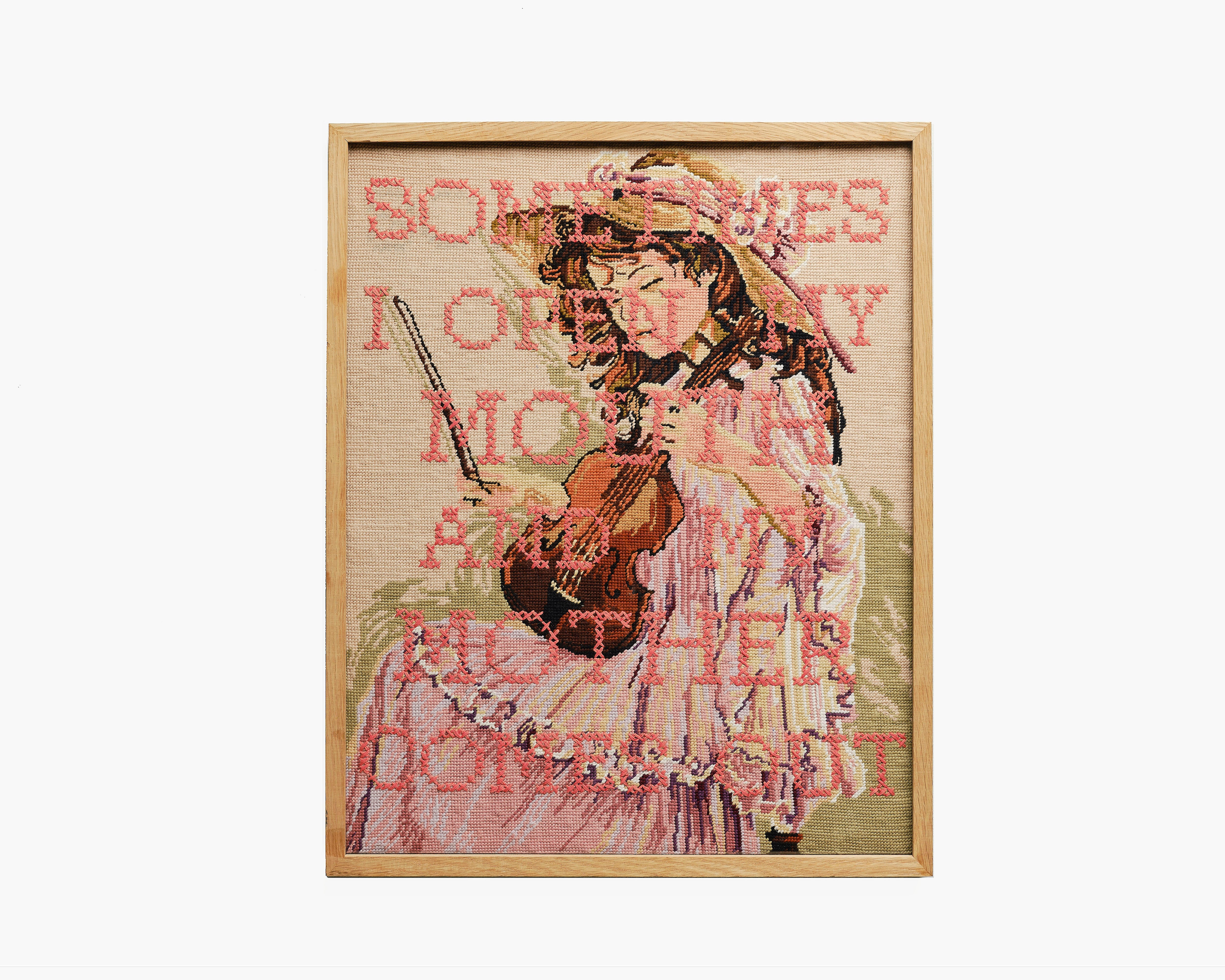 Upcycled framed sampler, front view 