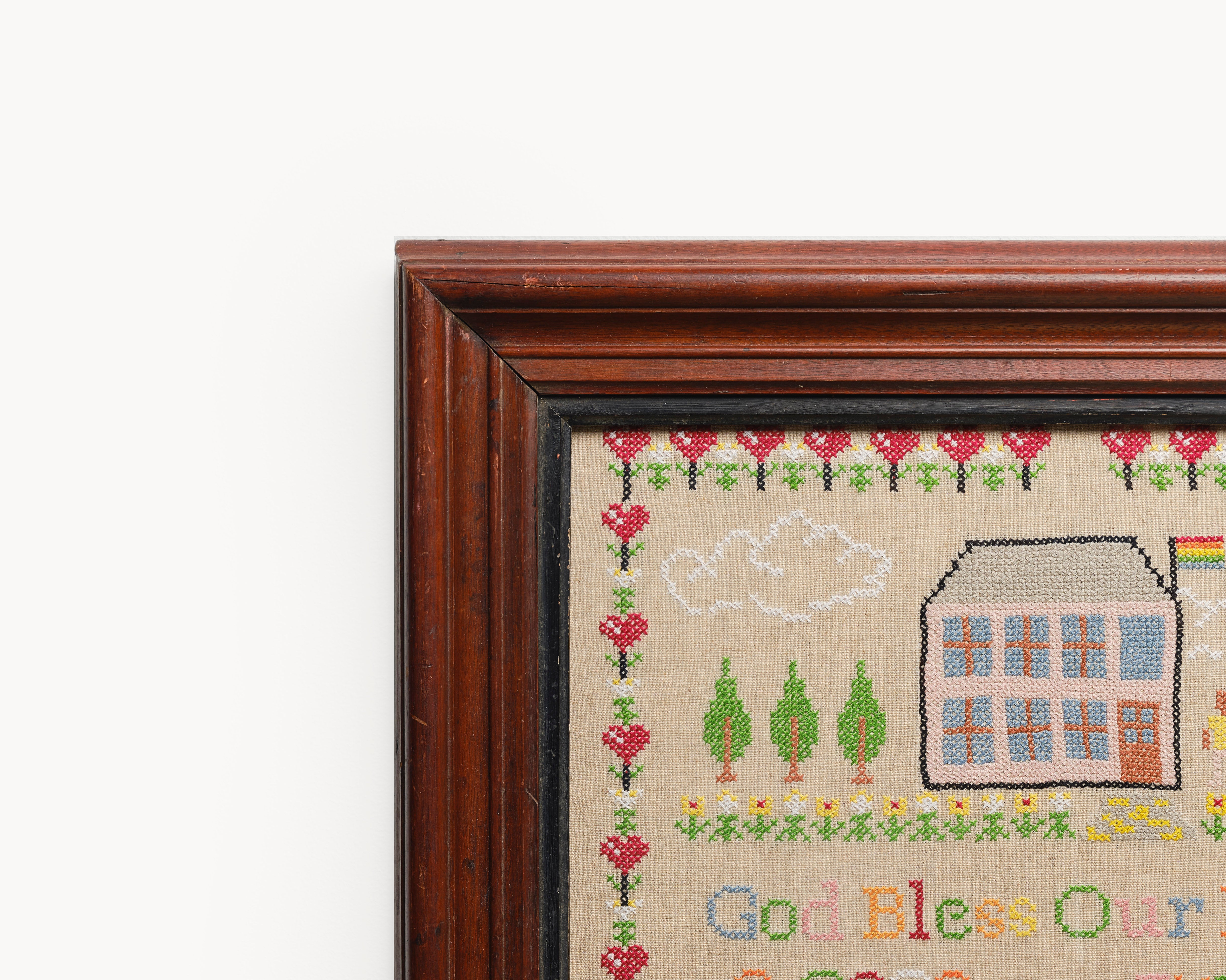 Upcycled framed sampler, close up view 