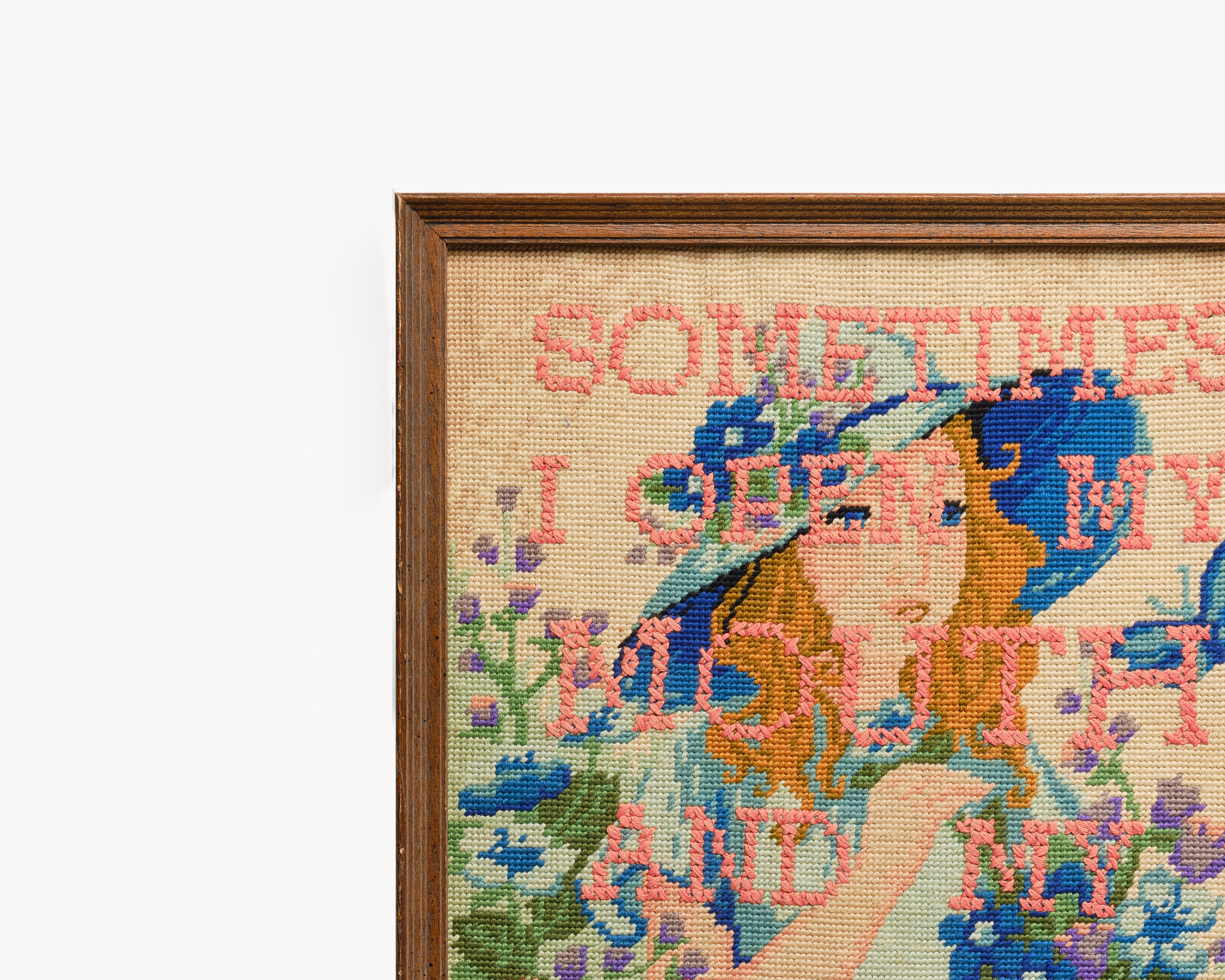 Upcycled framed sampler, close up view 
