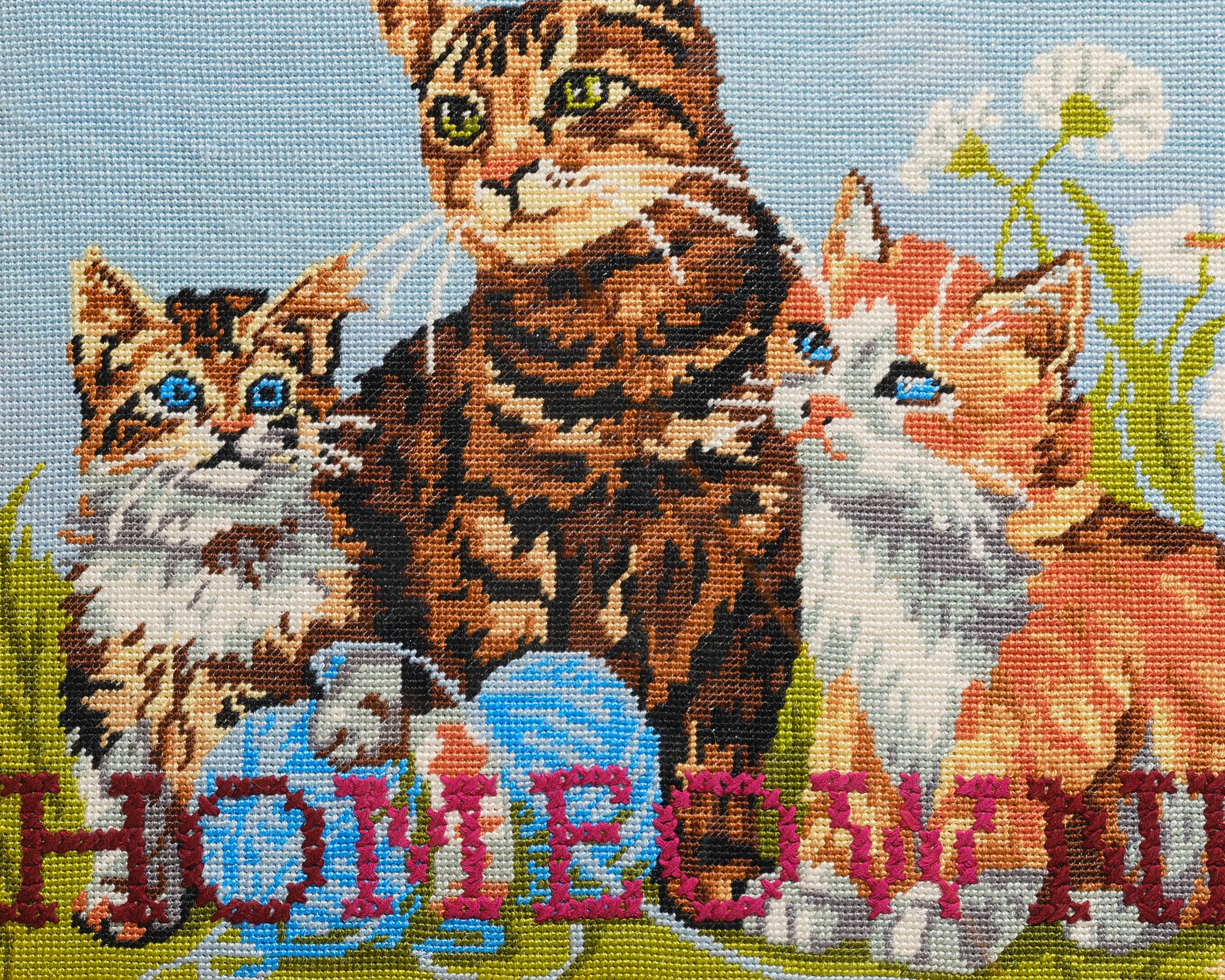 Upcycled framed sampler, close up view 