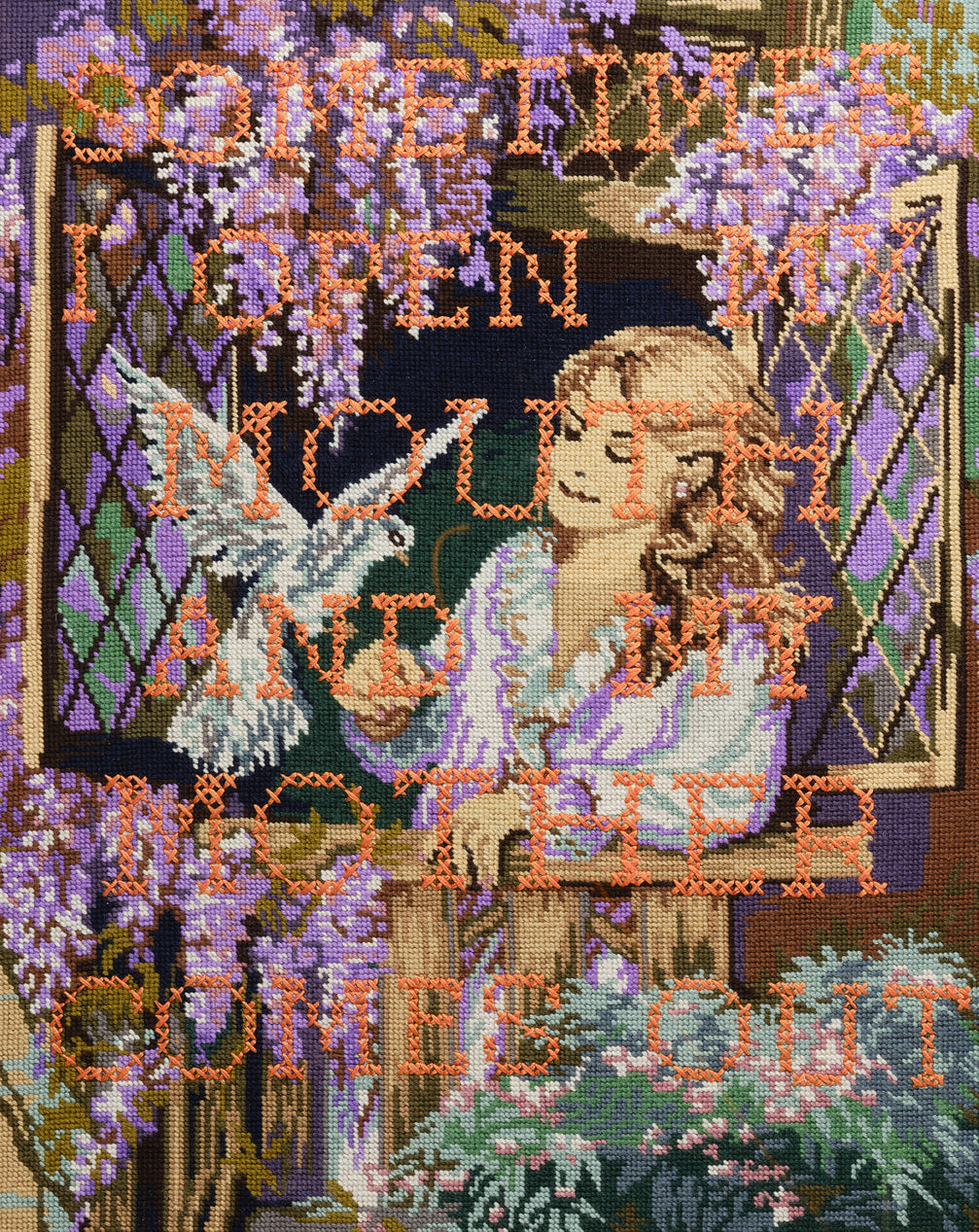 Upcycled framed sampler, close up view 