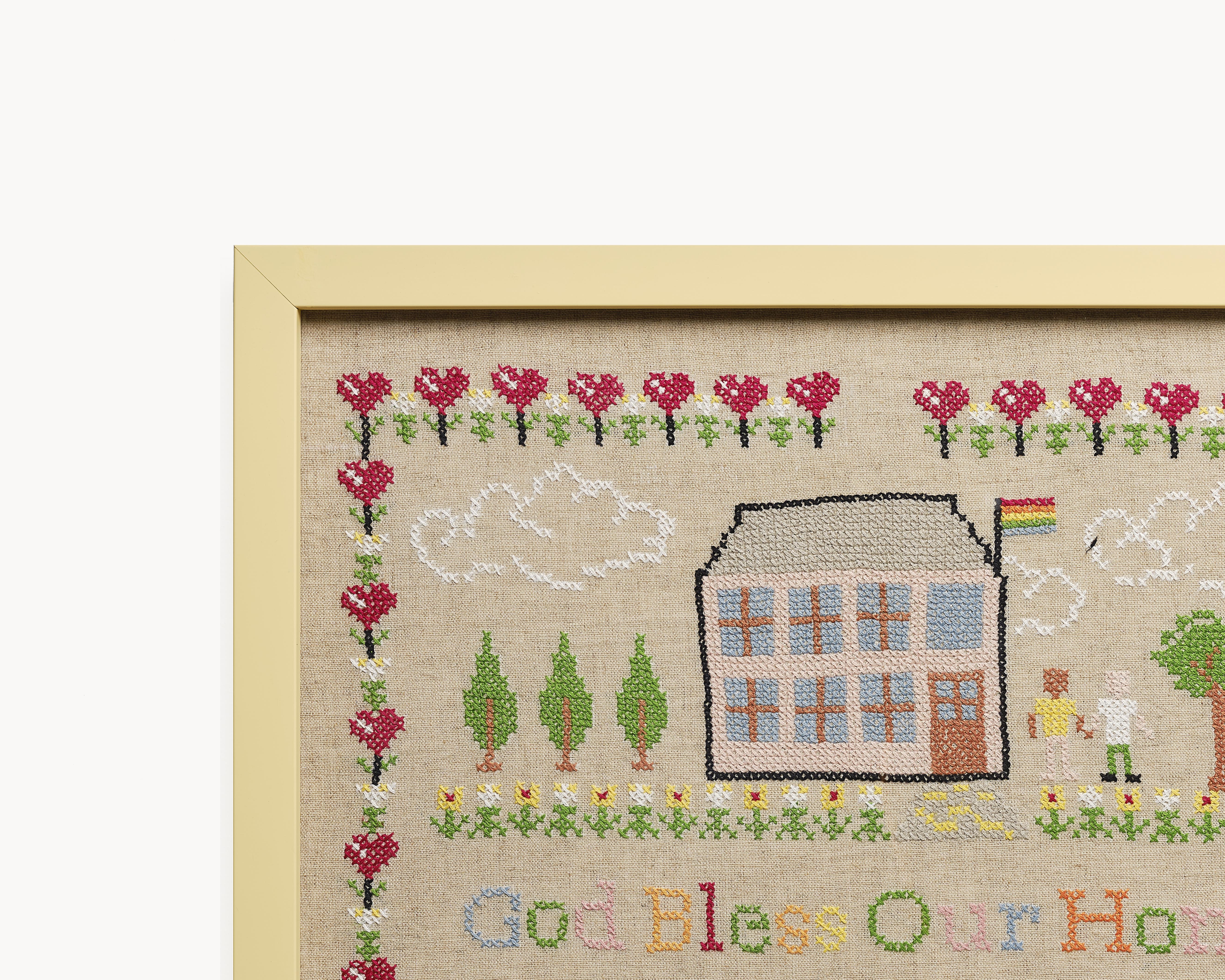 Upcycled framed sampler, close up view 