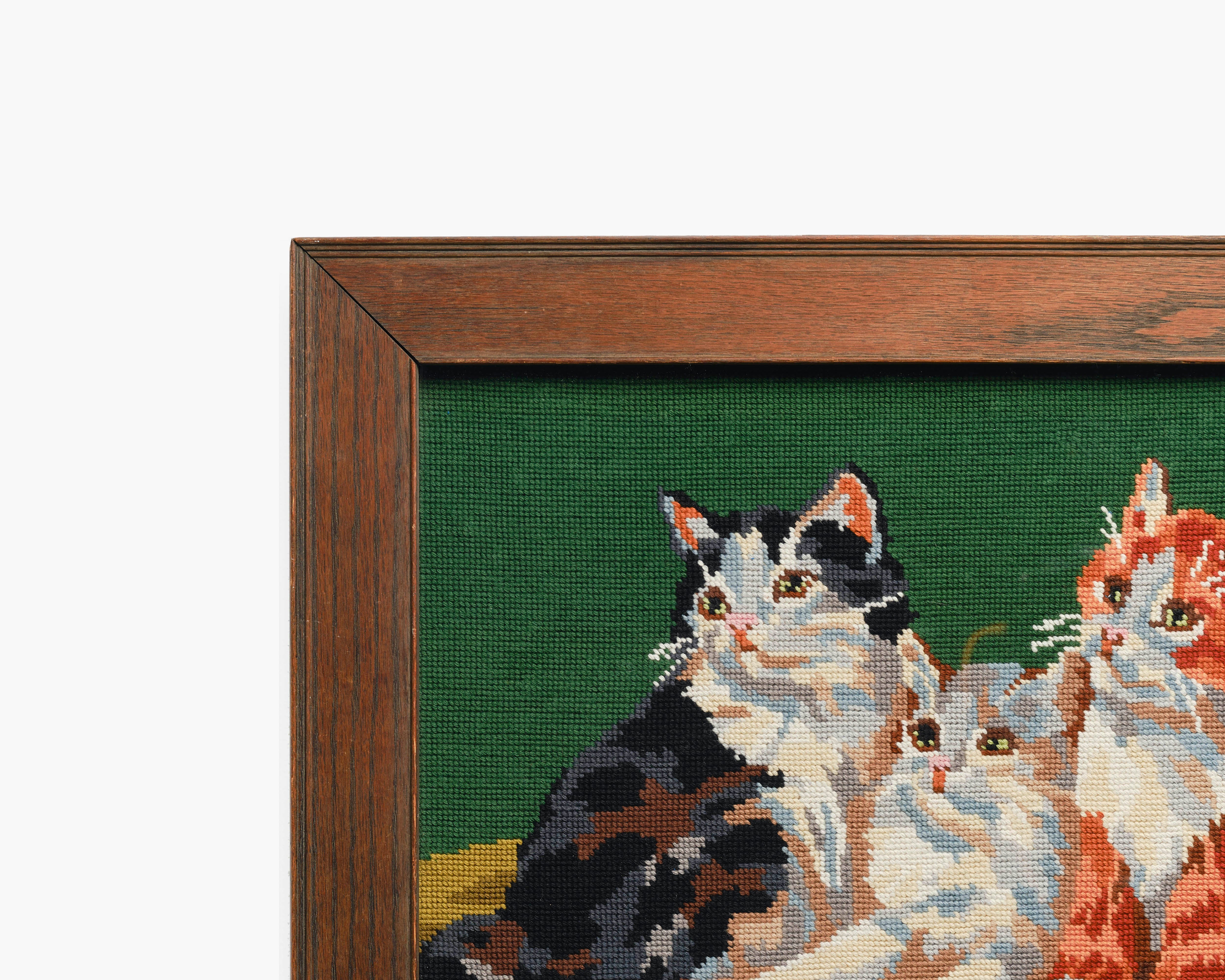 Upcycled framed sampler, close up view 