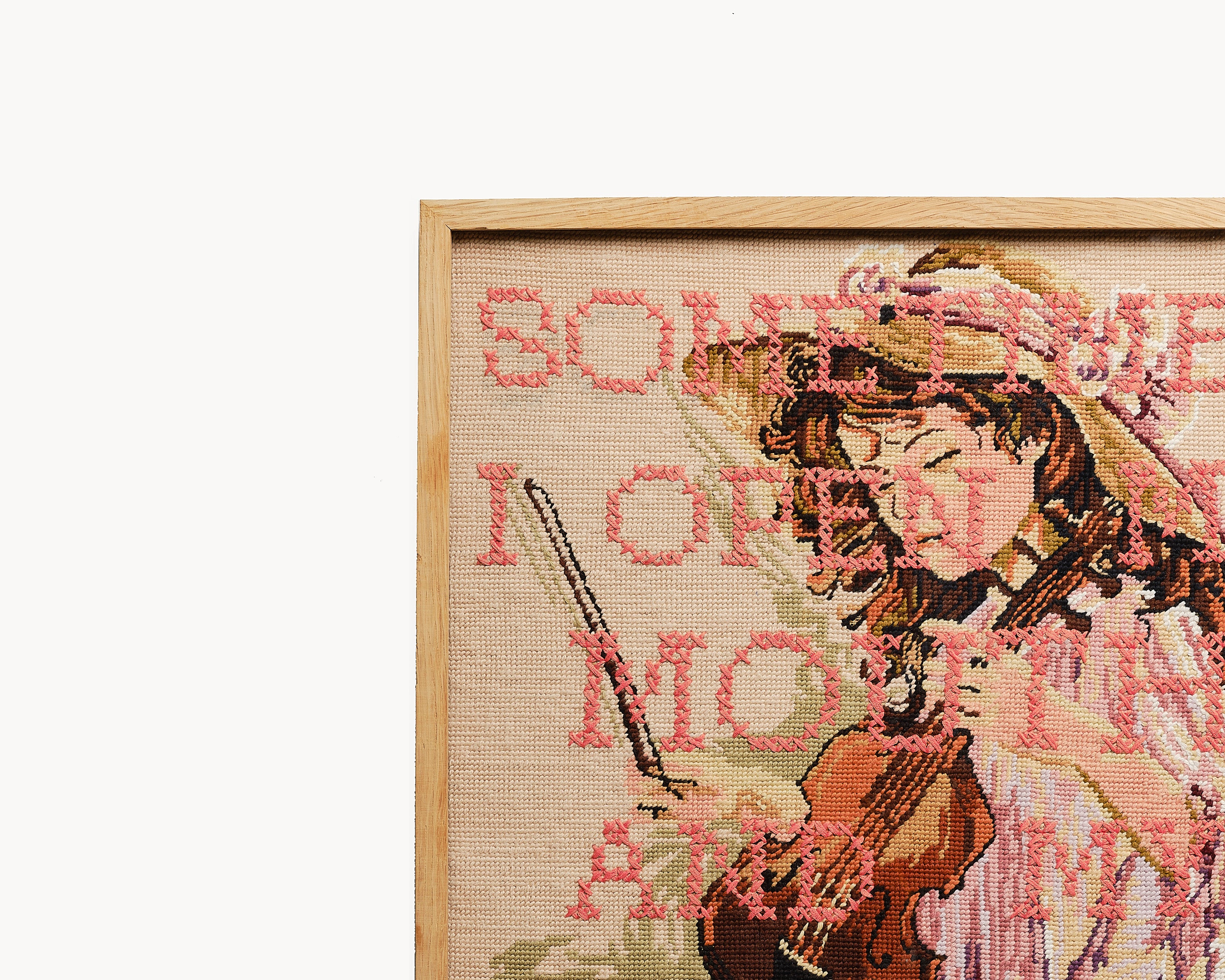 Upcycled framed sampler, close up view 