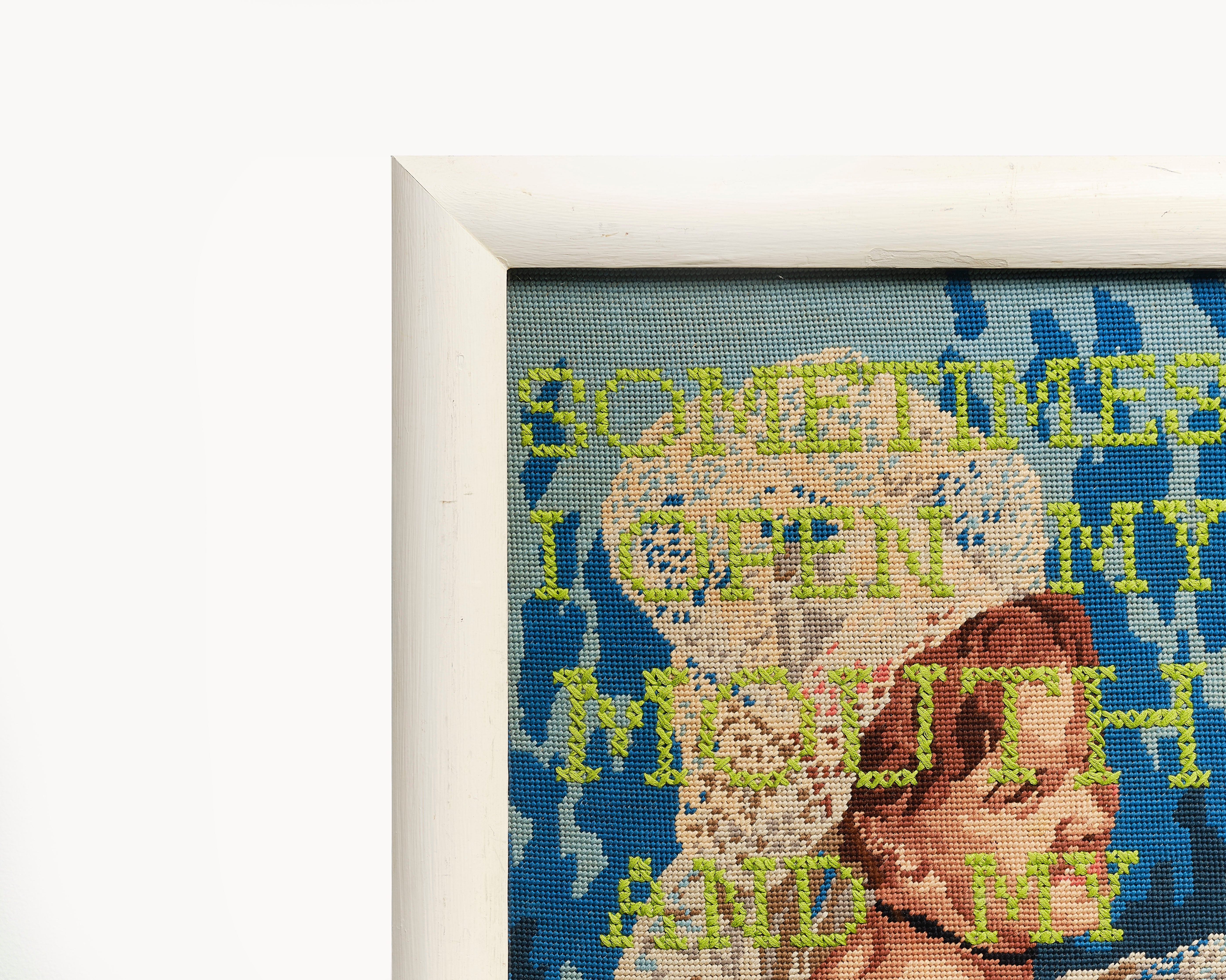 Upcycled framed sampler, close up view 