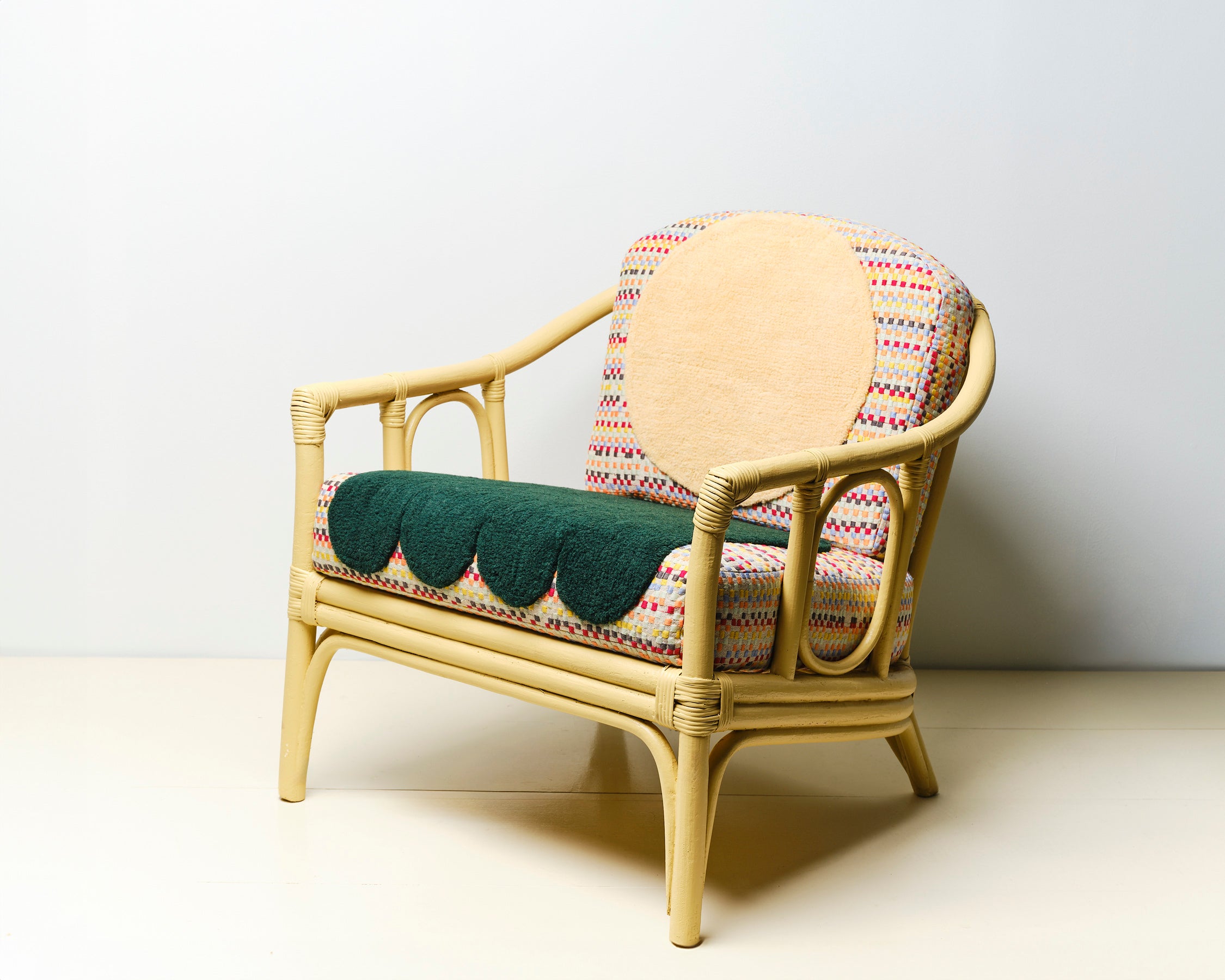 Upcycled chair with tufted and embroidered embellishments, side view 