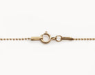 Upcycled necklace with gold plated quarter with diamond smile, clasp view  