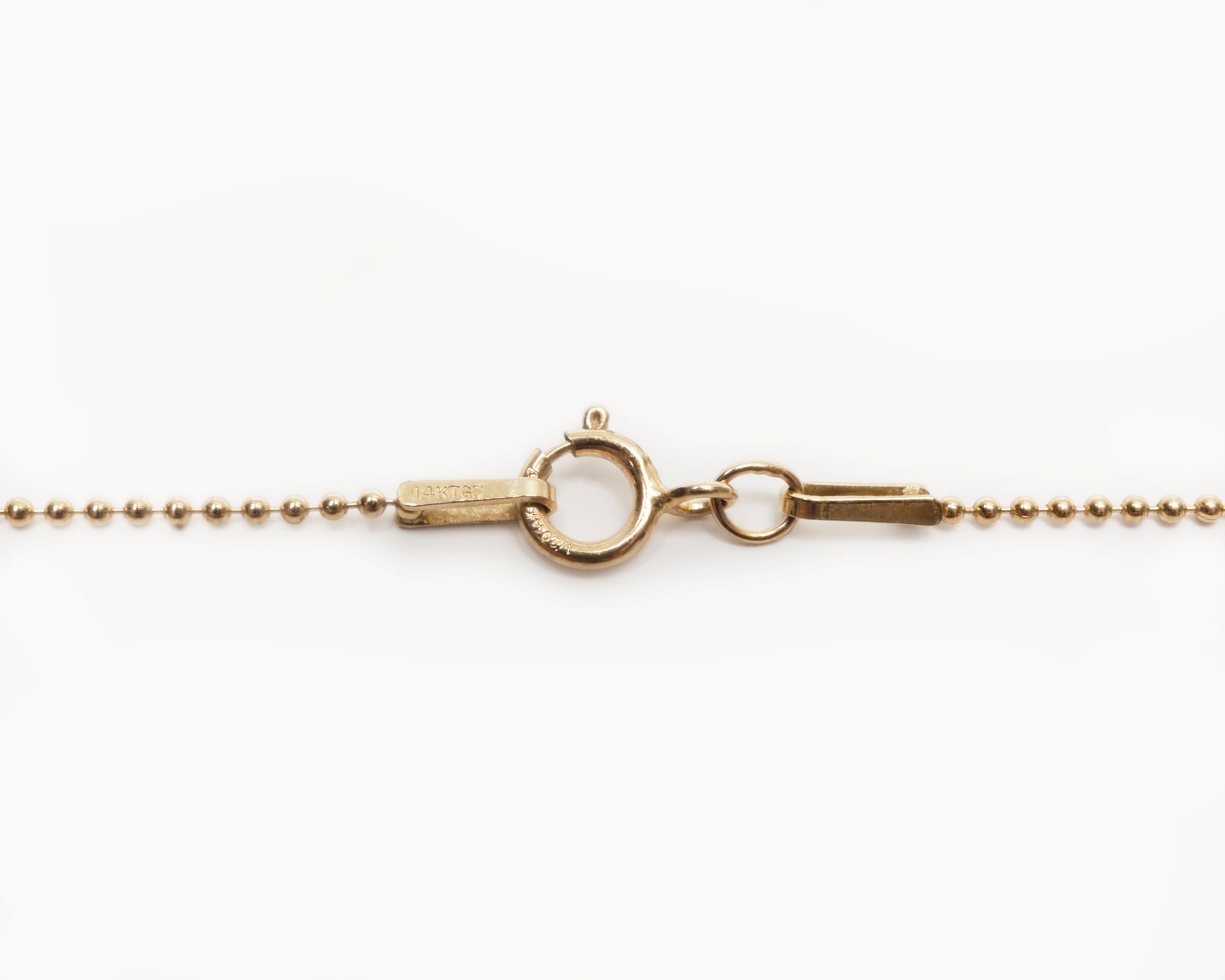 Upcycled necklace with gold plated quarter with diamond smile, clasp view  