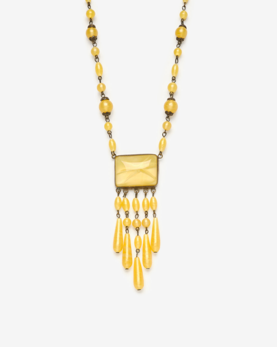 Vintage yellow beaded necklace, closeup view.