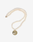 Upcycled necklace with gold plated quarter with pearl strand, whole necklace view  