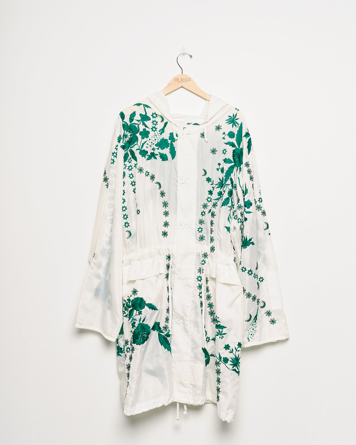 Vintage white parka with embroidered embellishments, front view