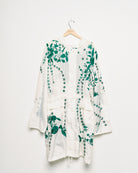 Vintage white parka with embroidered embellishments, front view