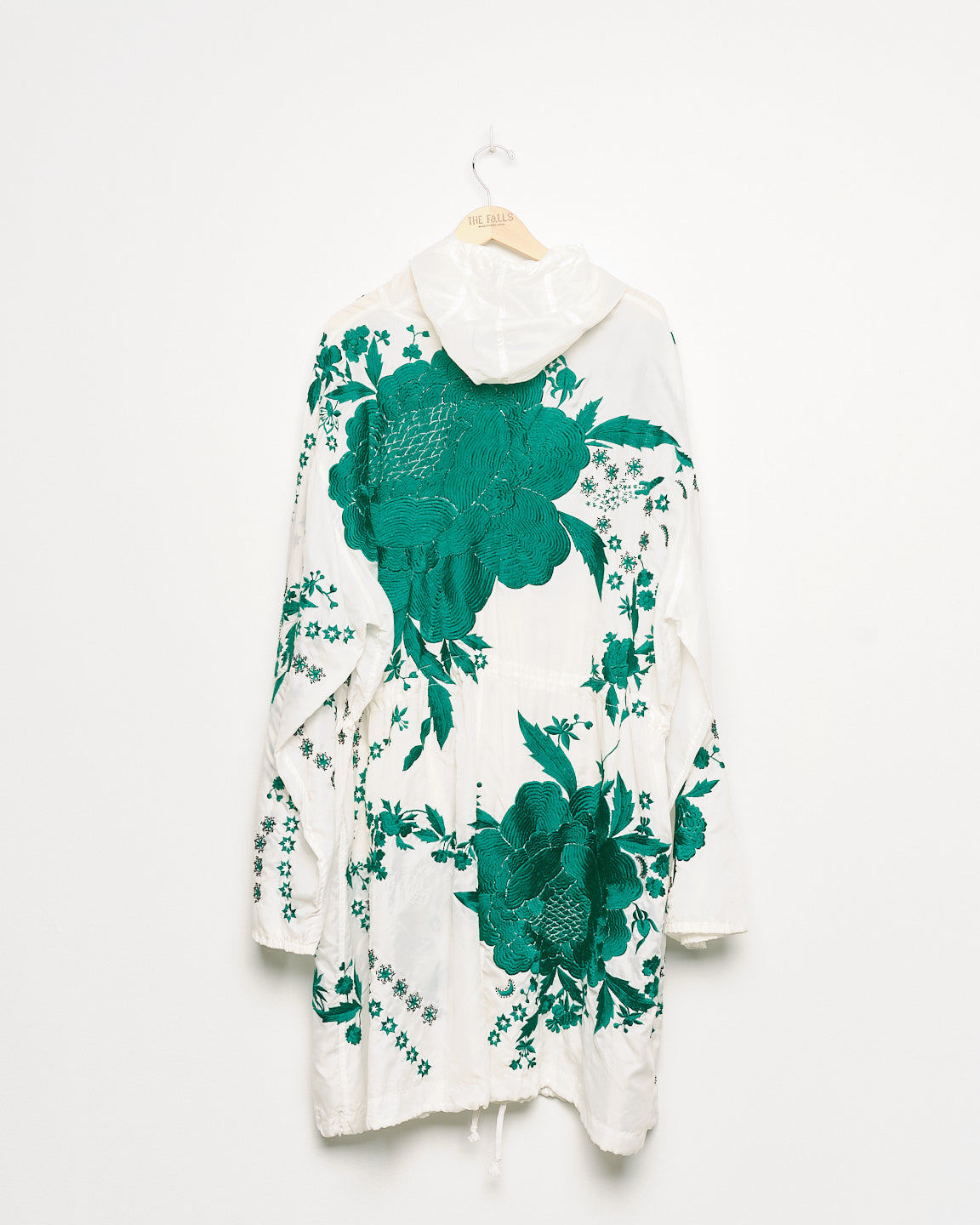 Vintage white parka with embroidered embellishments, back view