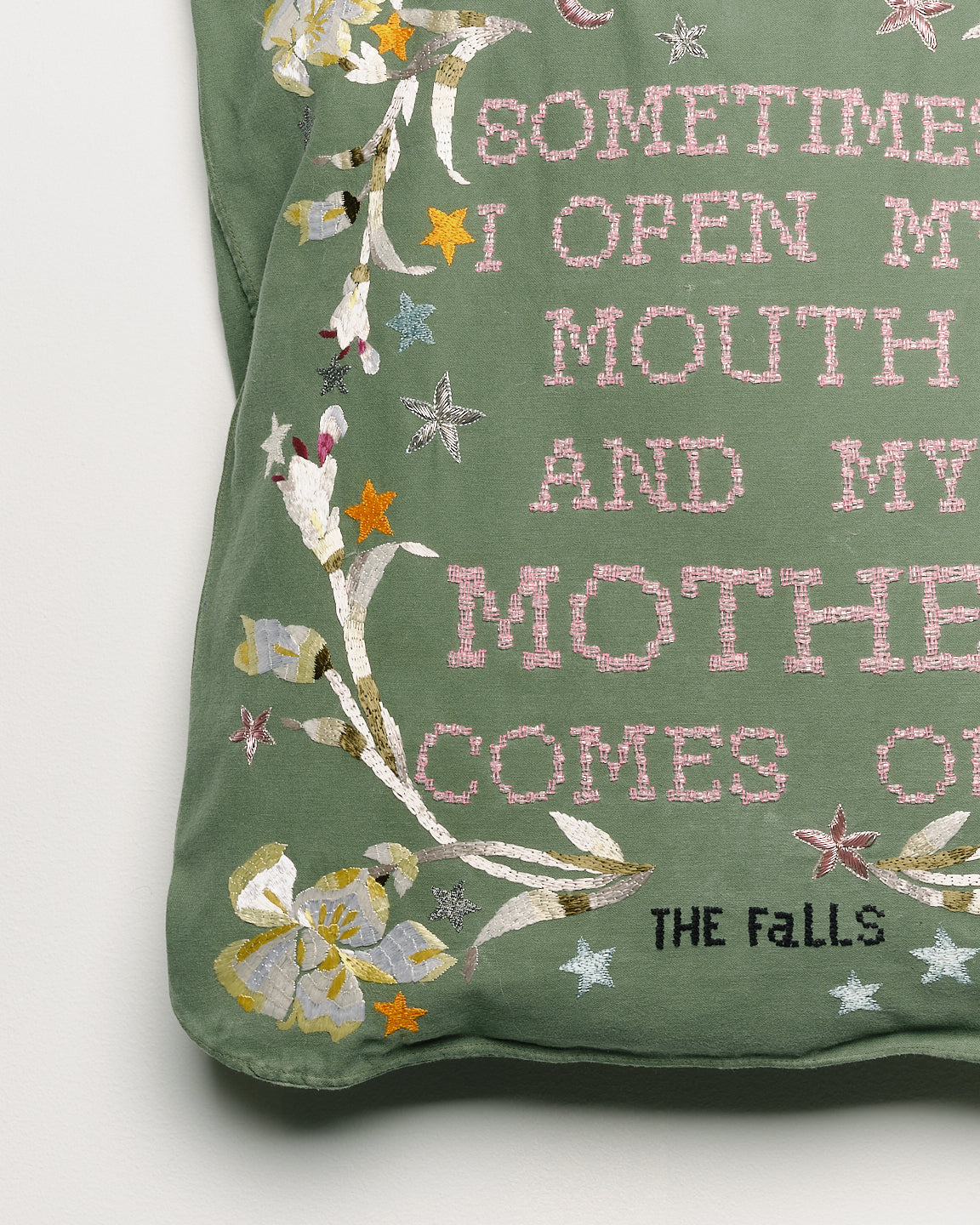 Bag with embroider embellishments, close up view 