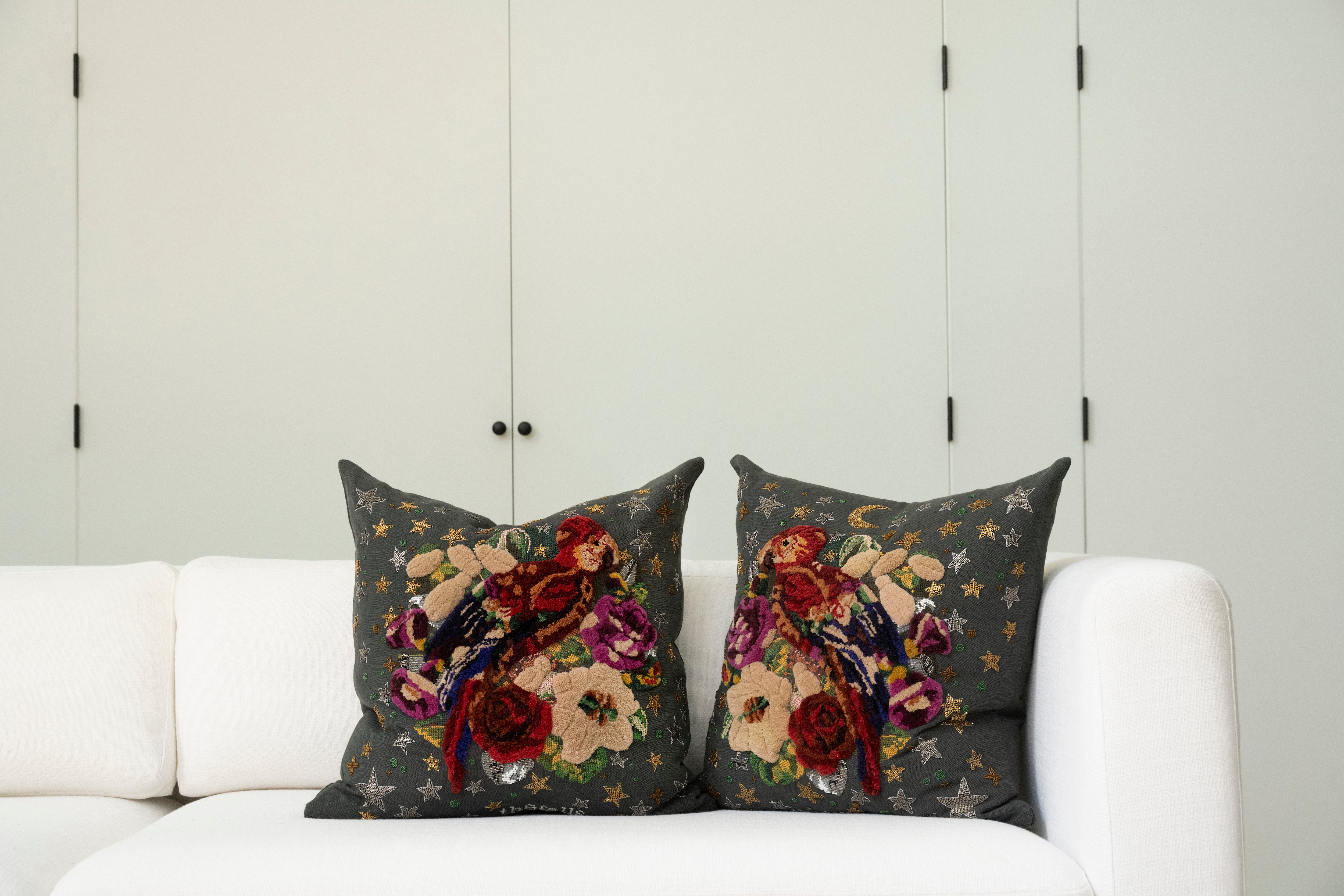 Pillow with tufted embellishments, pair view 