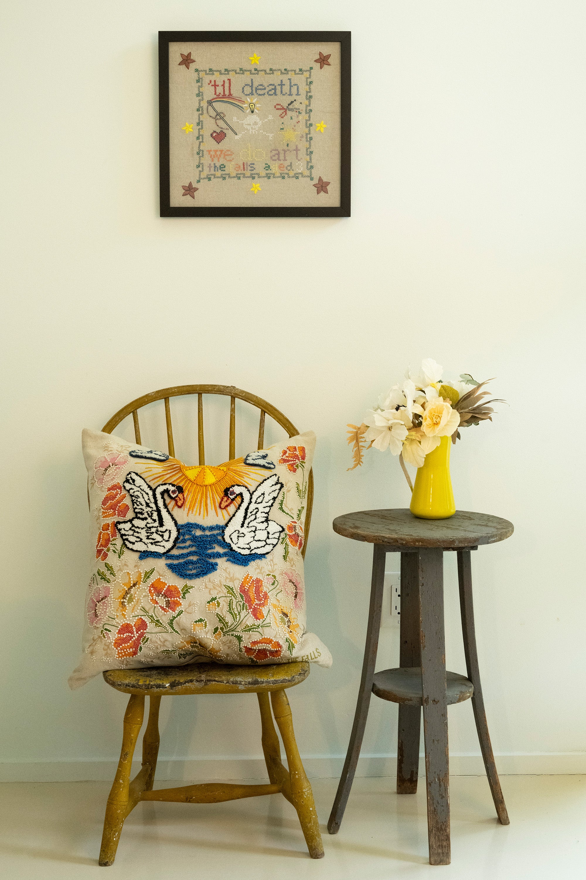 Upcycled framed sampler, room view 