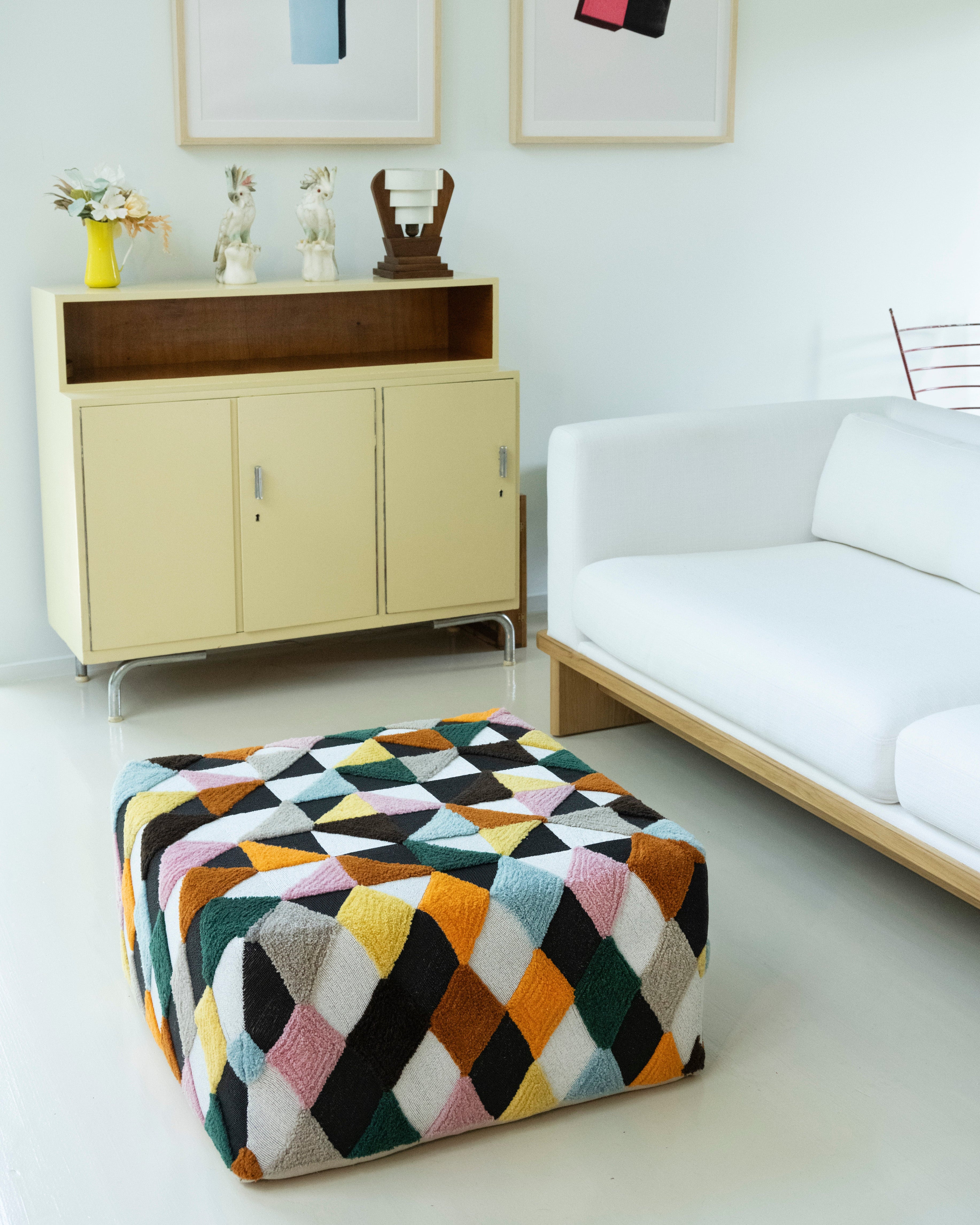 Beaded and tufted embellished square pouff, side view