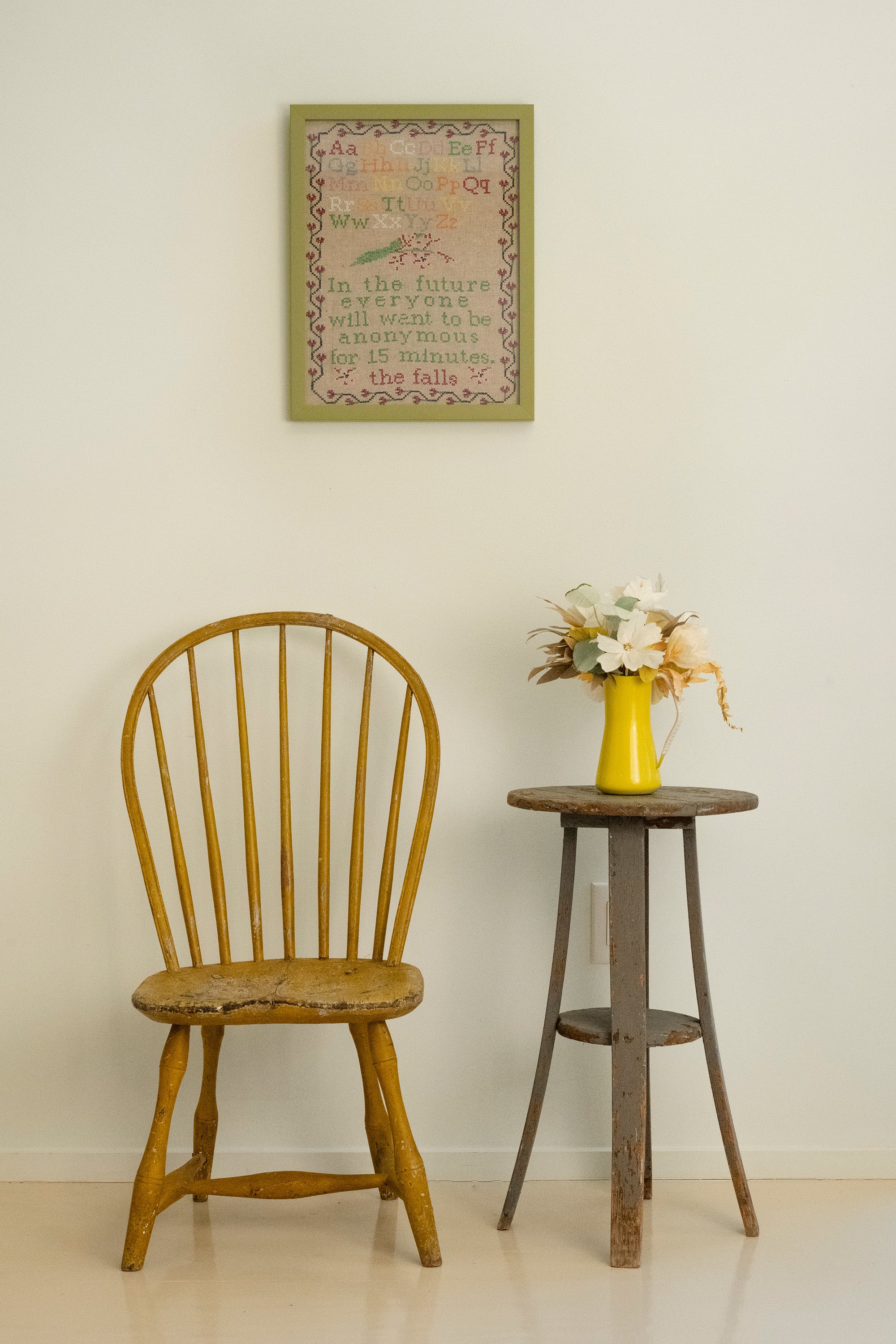 Upcycled framed sampler, room view 