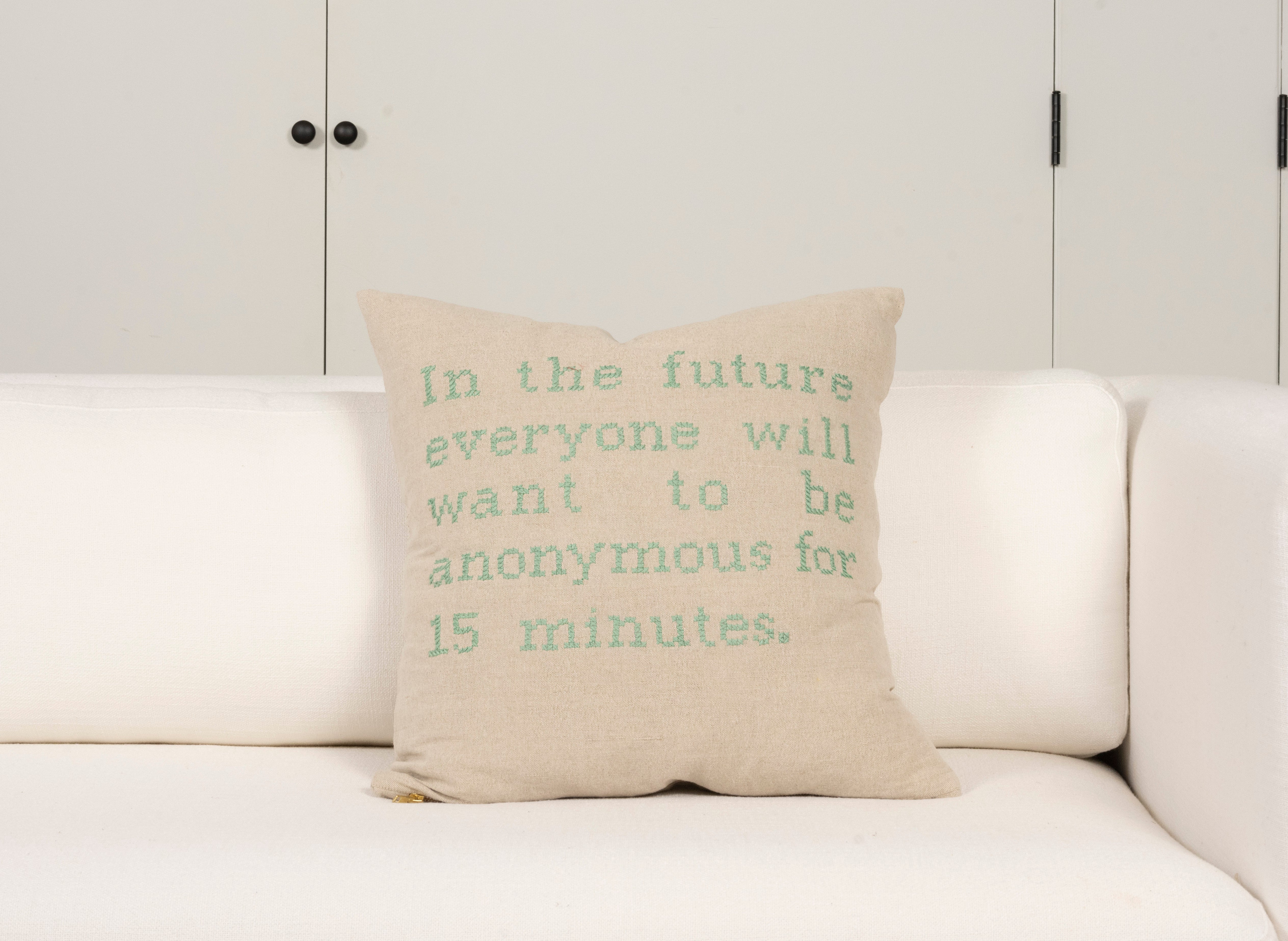 Pillow with embroidery embellishments, front view 