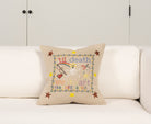 Pillow with embroidery embellishments, front view 