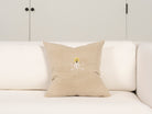 Pillow with embroidery embellishments, back view 