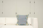 Pillow with embroidery embellishments, font view 
