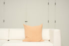 Pillow with embroidery embellishments, back view 