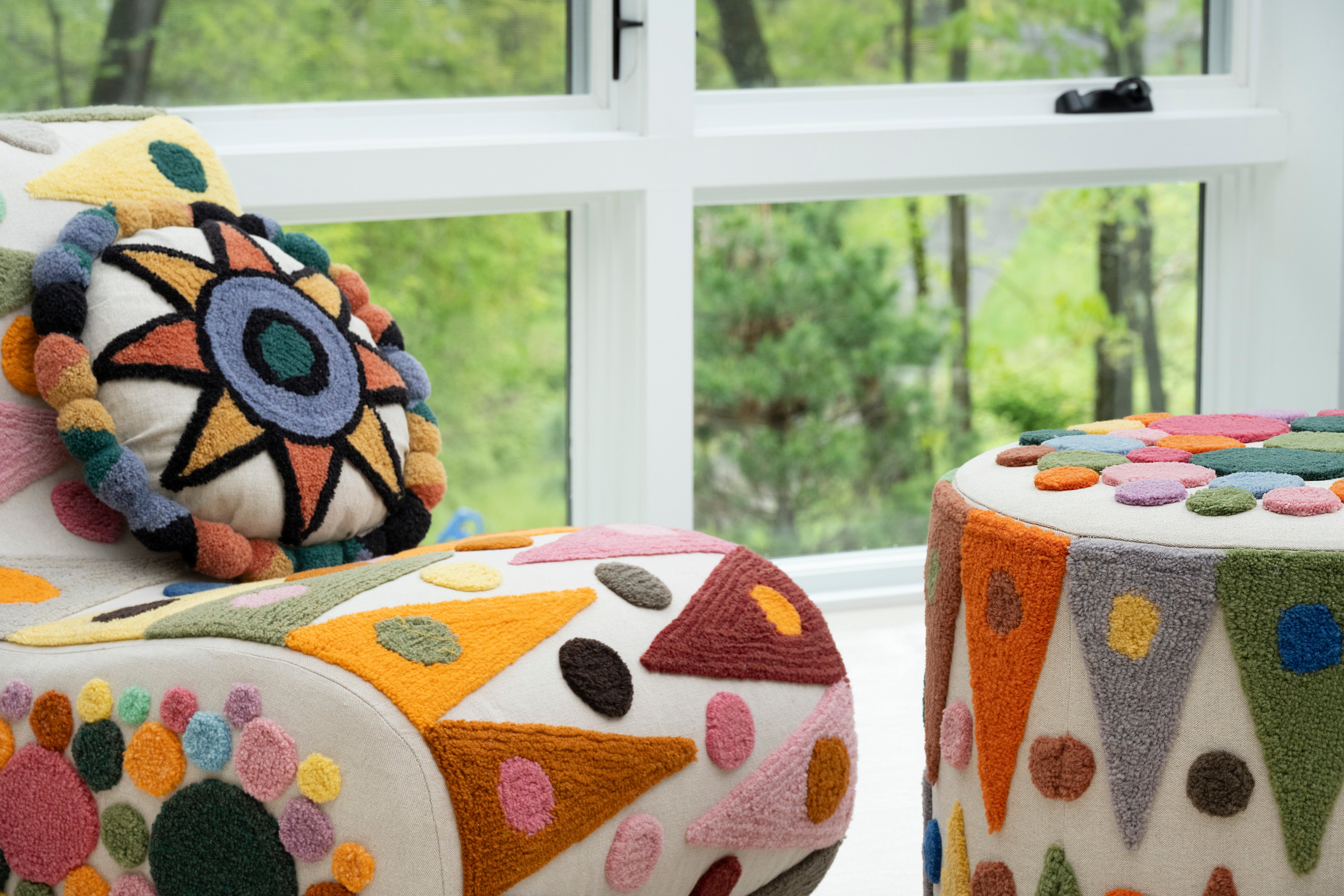 Pillow with tufted embellishments, group view 