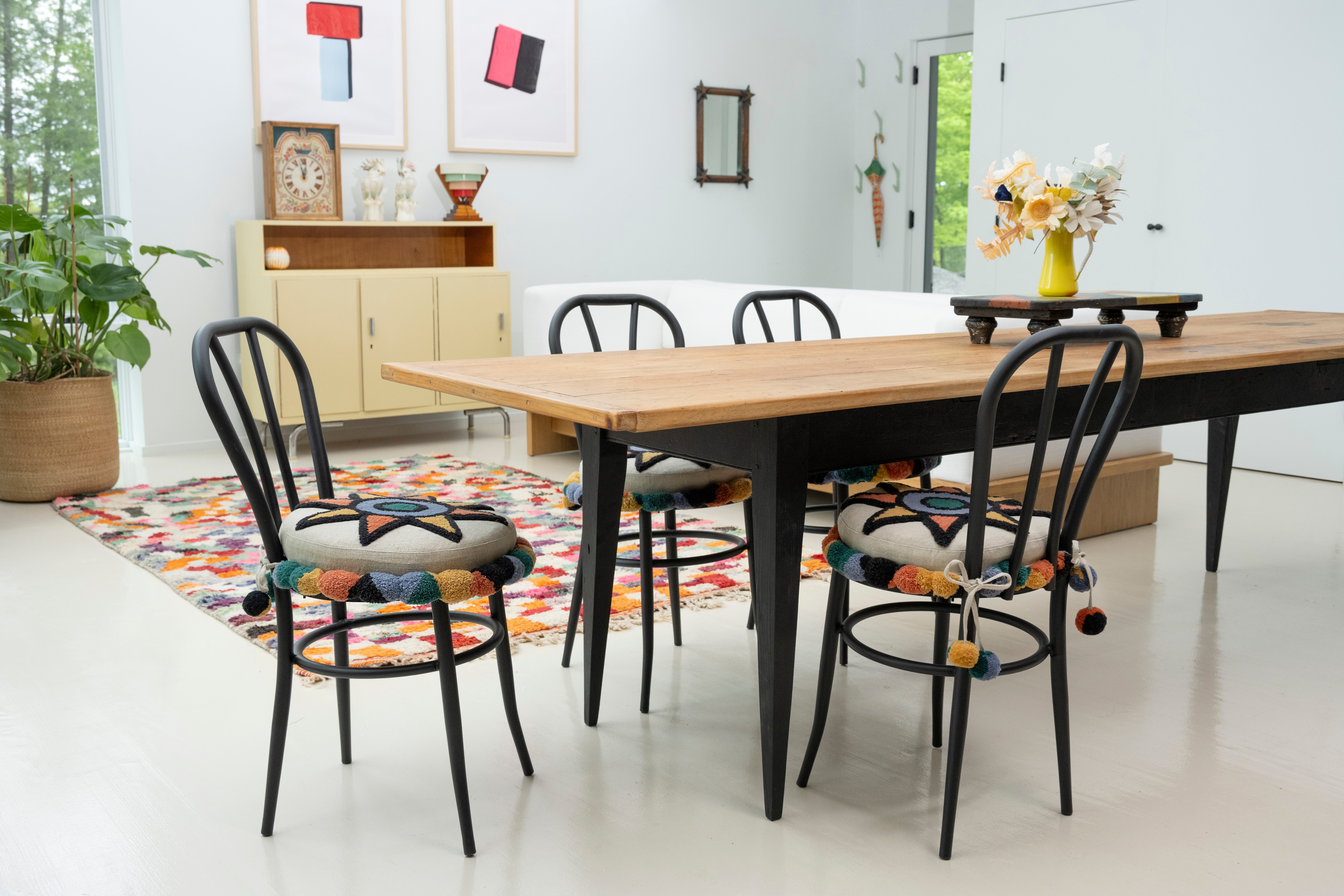 Upcycled chair with tufted embellishments, in dining room view