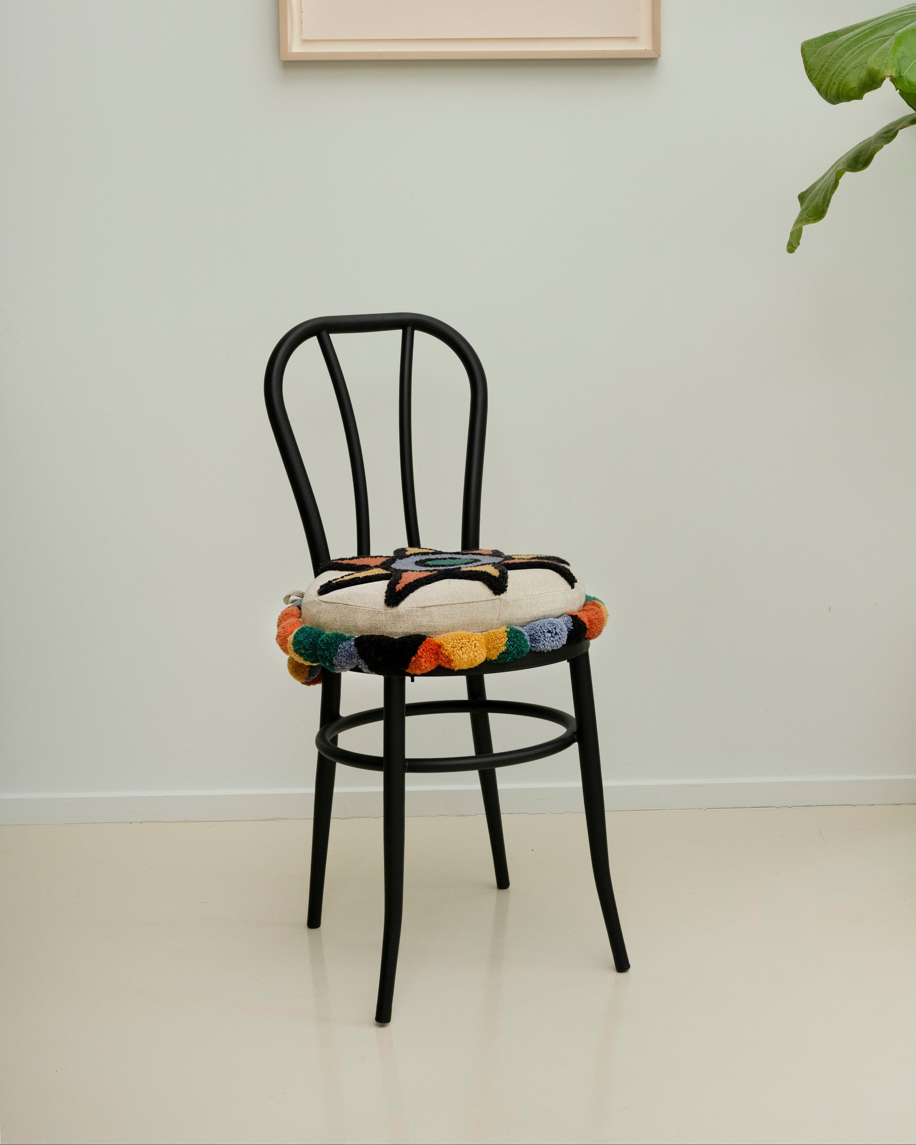 Upcycled chair with tufted embellishments, font view 