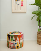 Pouff with tufted embellishment, front view