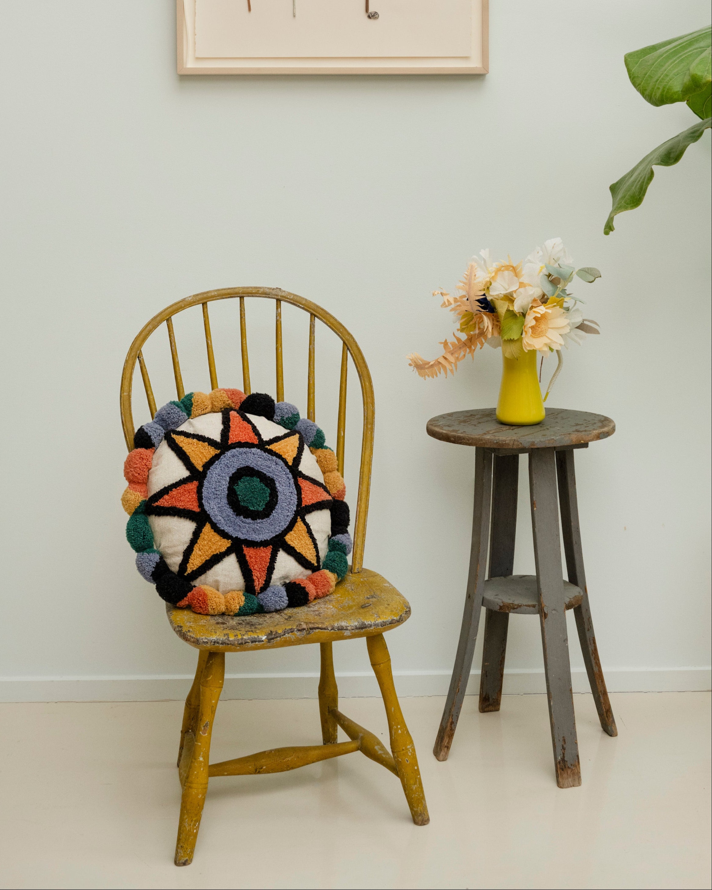Pillow with tufted embellishments, font view 