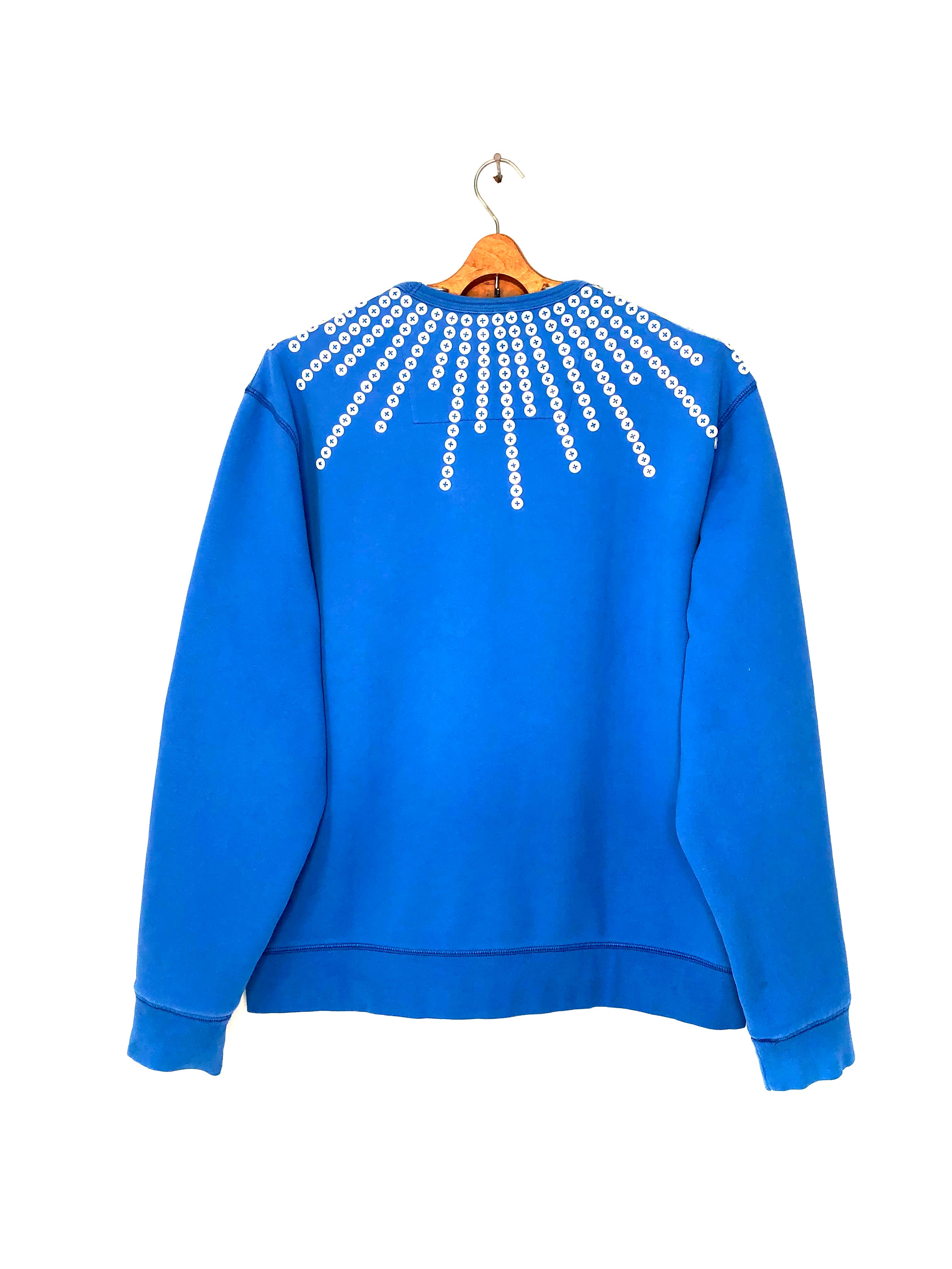 Upcycled sweatshirt with pearl button embellishments, back view
