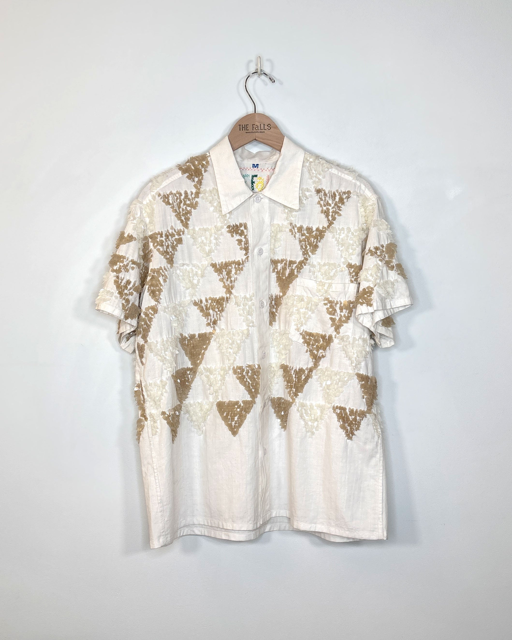 Upcycled t-shirt with sequin embellishments, front view