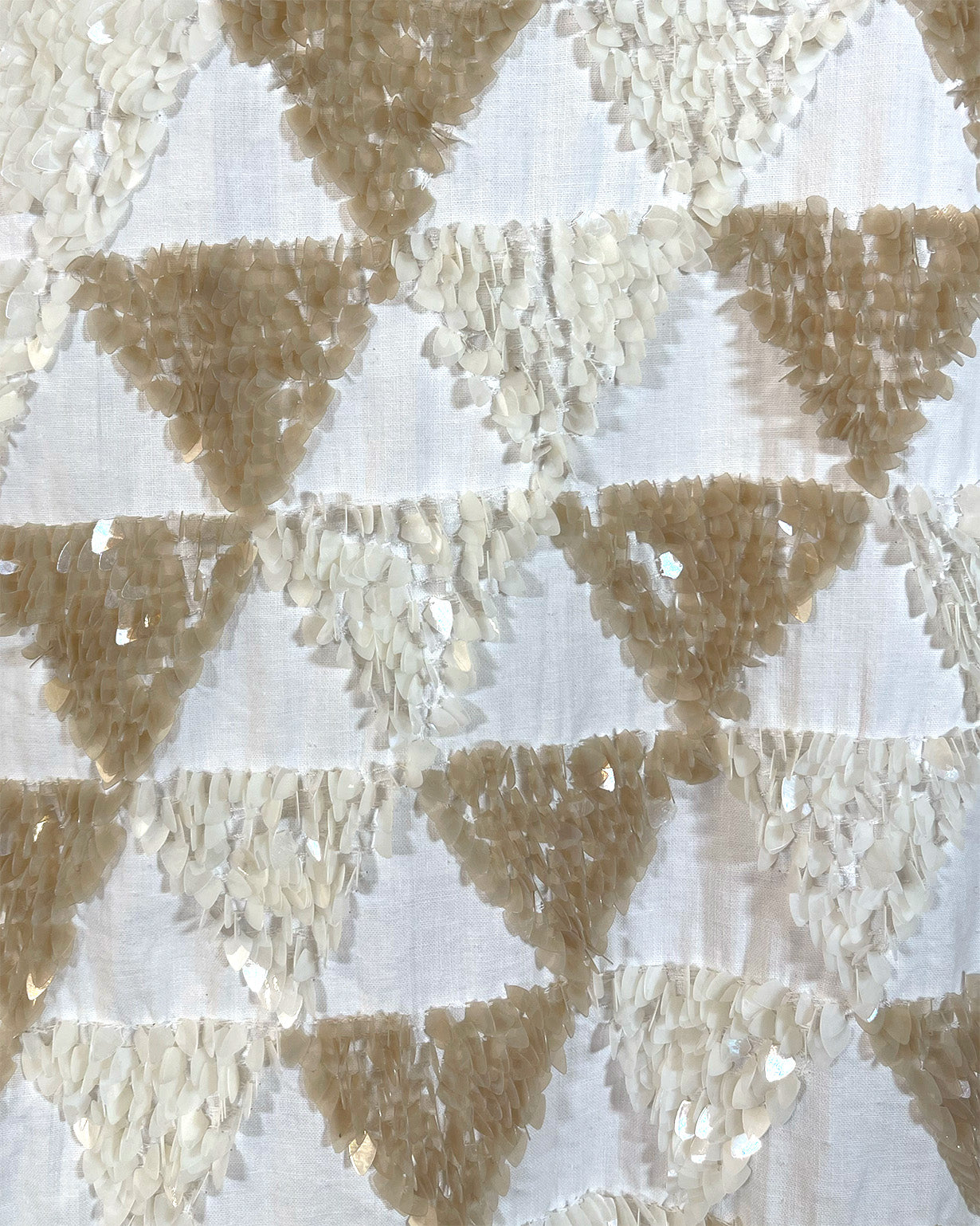 Upcycled t-shirt with sequin embellishments, close up view