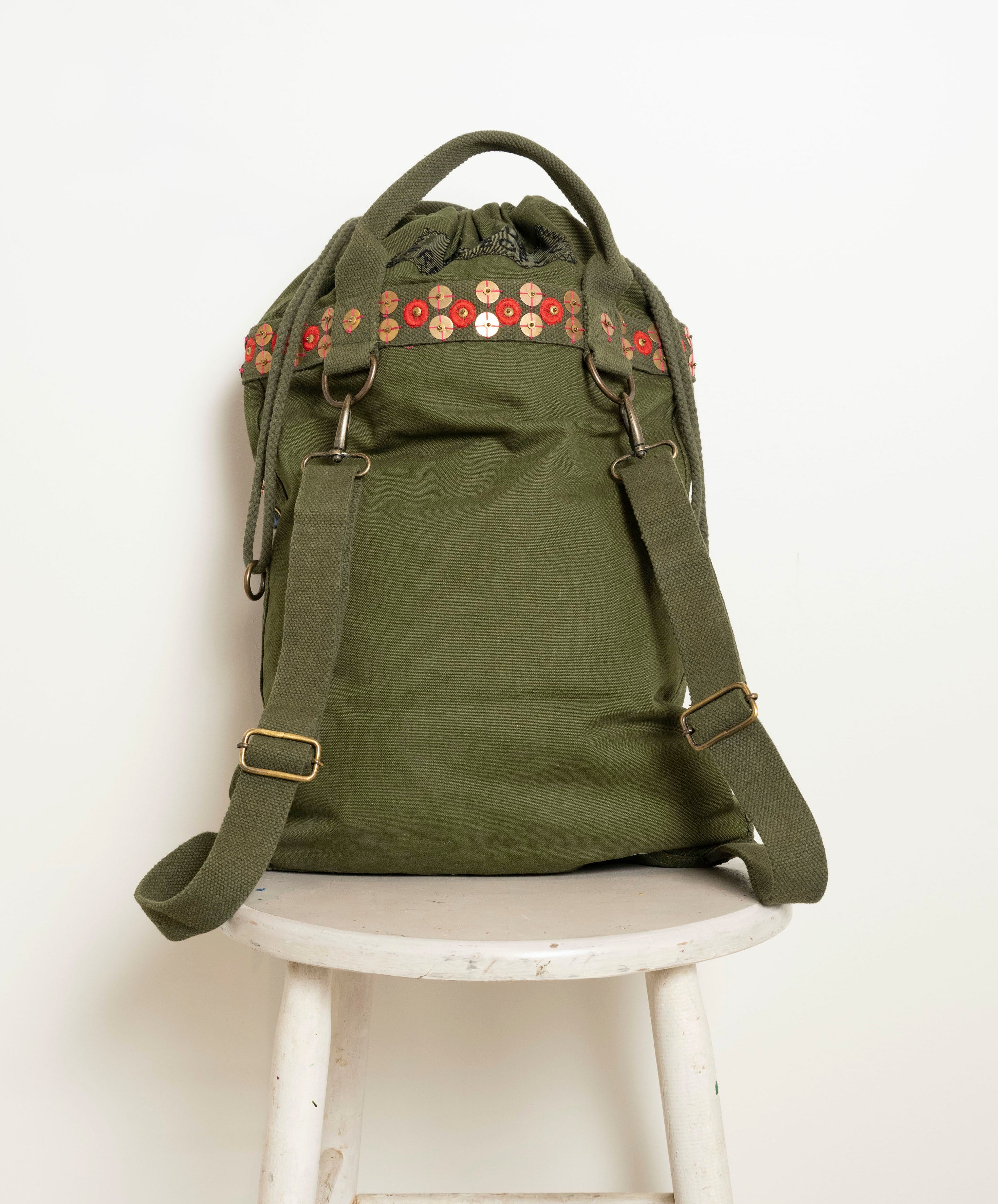 Bag with embroidered embellishments, front view 