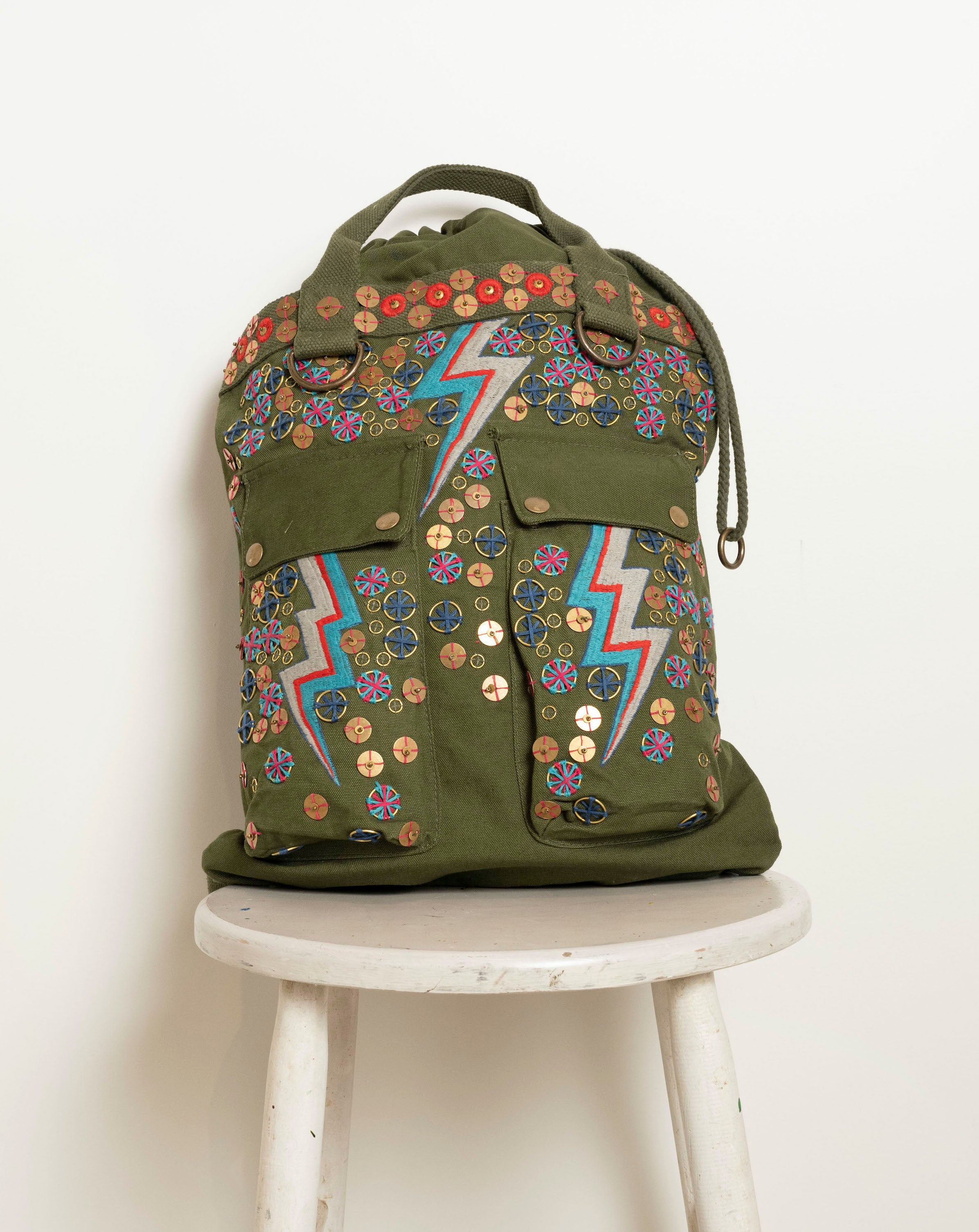 Bag with embroidered embellishments, front view 
